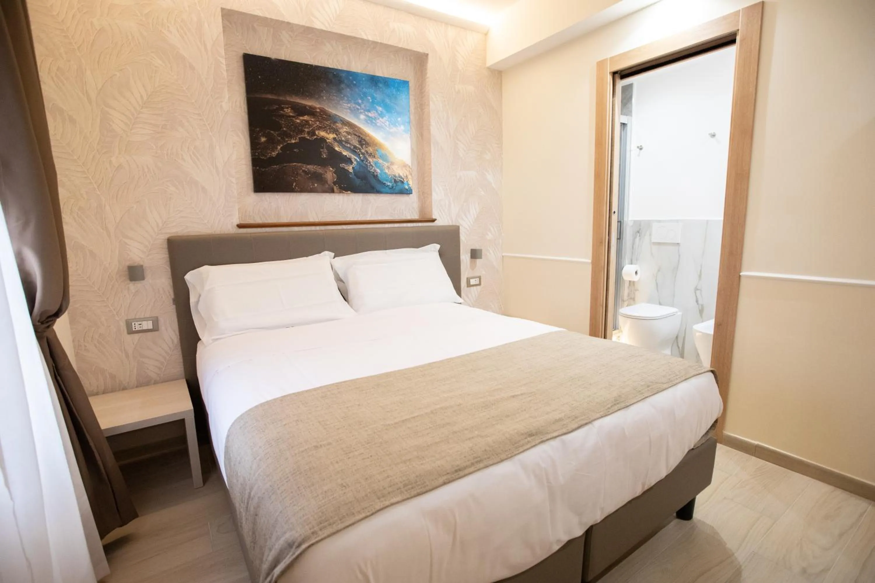 Bed in Hotel Maximus