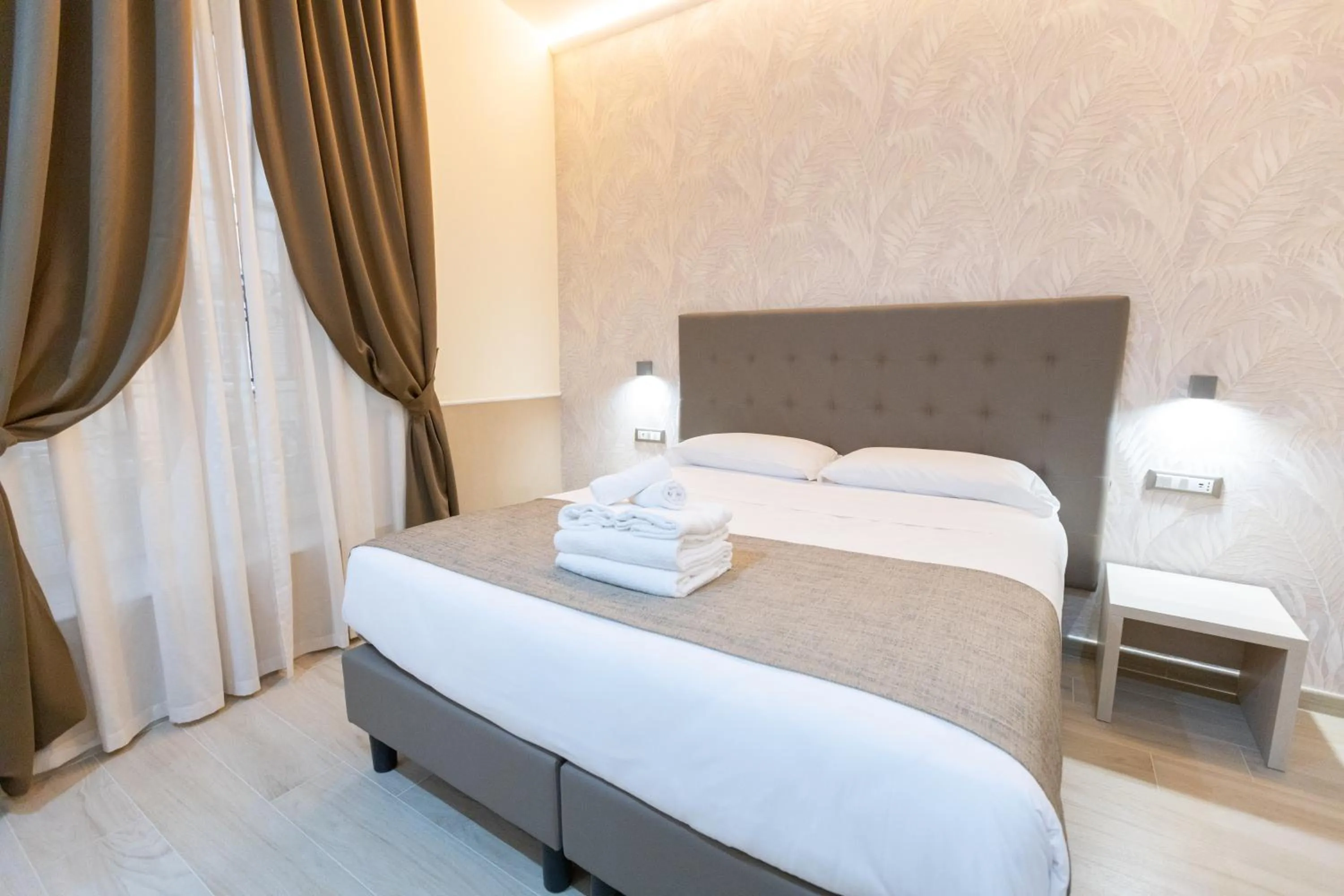 Bed in Hotel Maximus