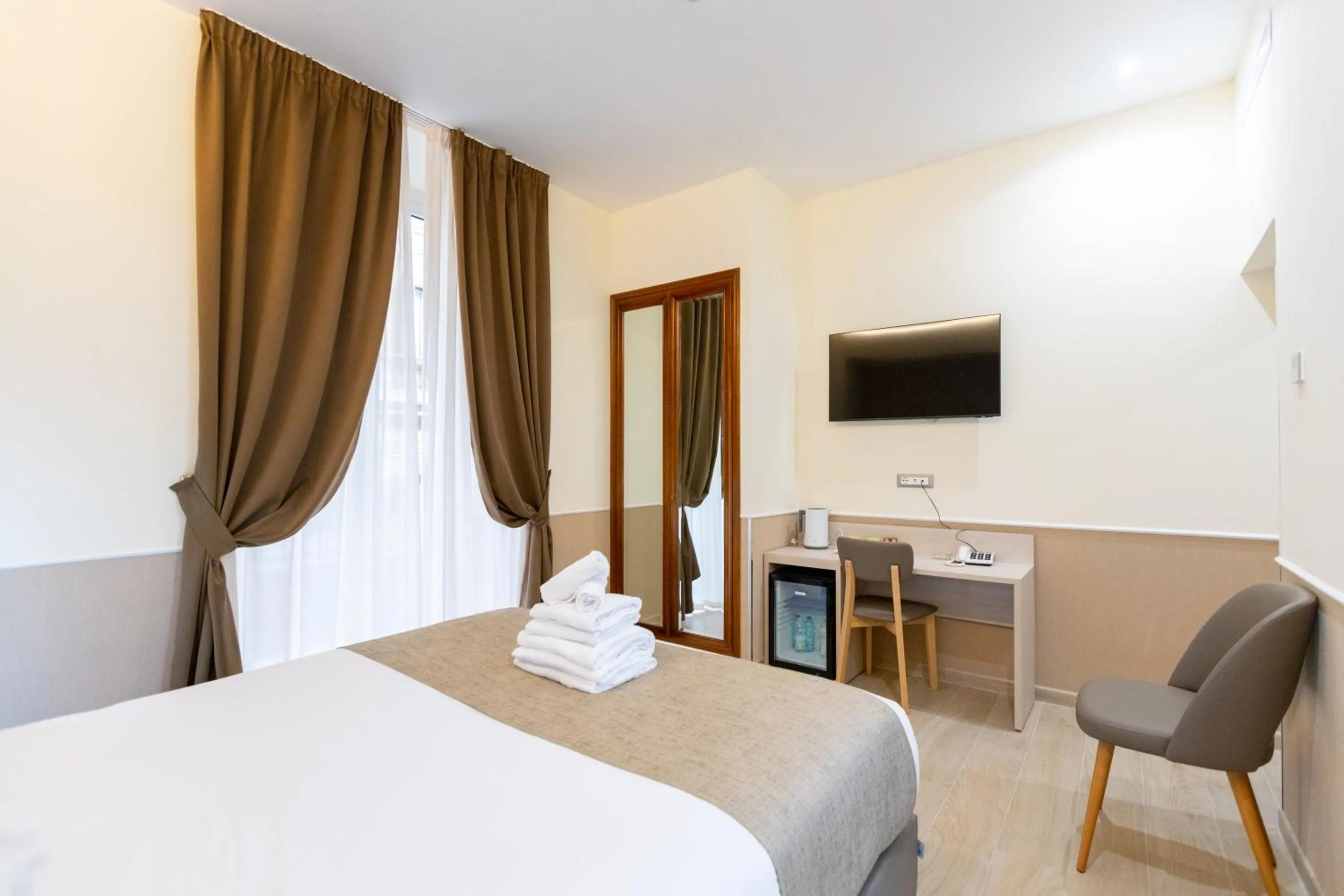 Bed in Hotel Maximus