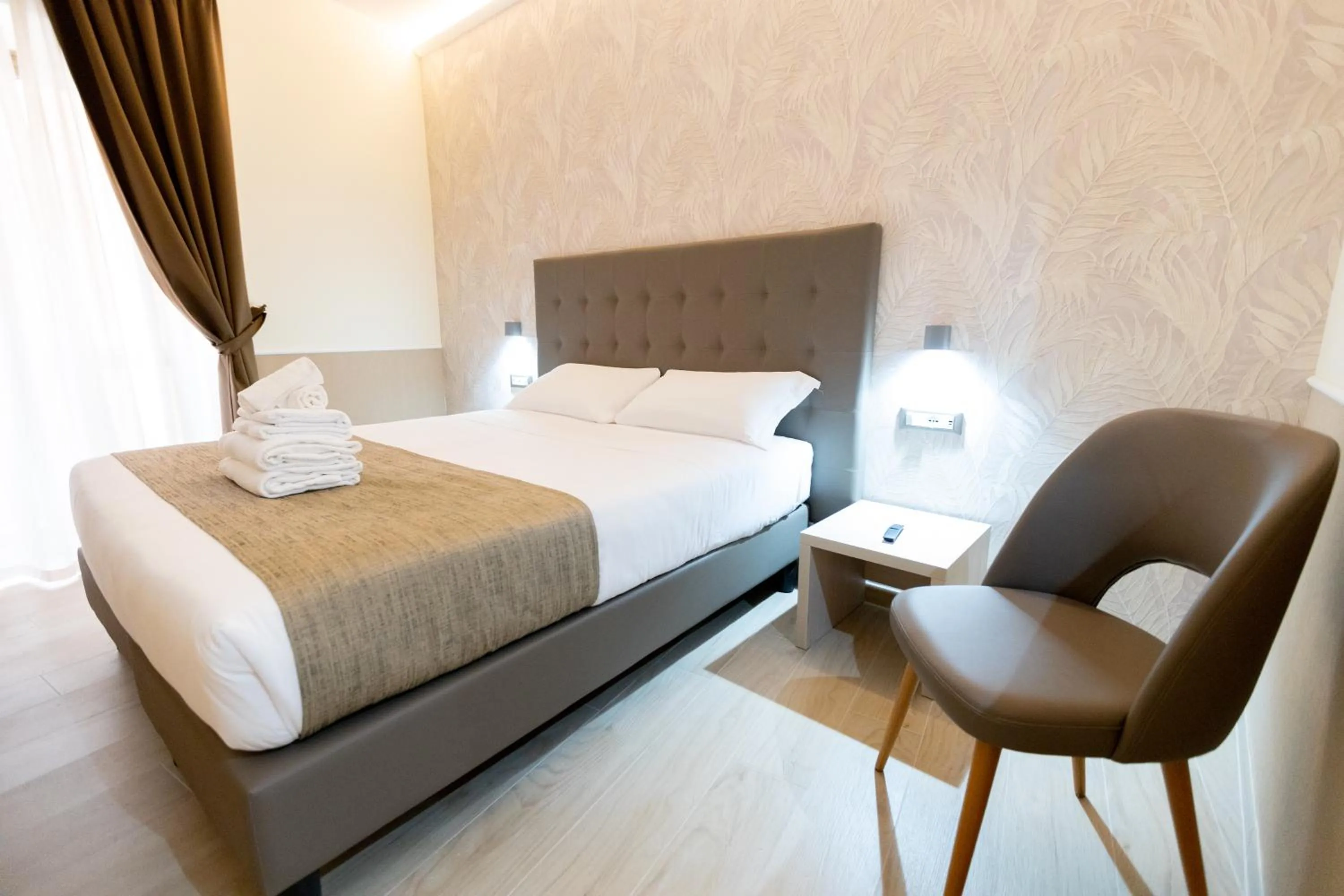 Bed in Hotel Maximus