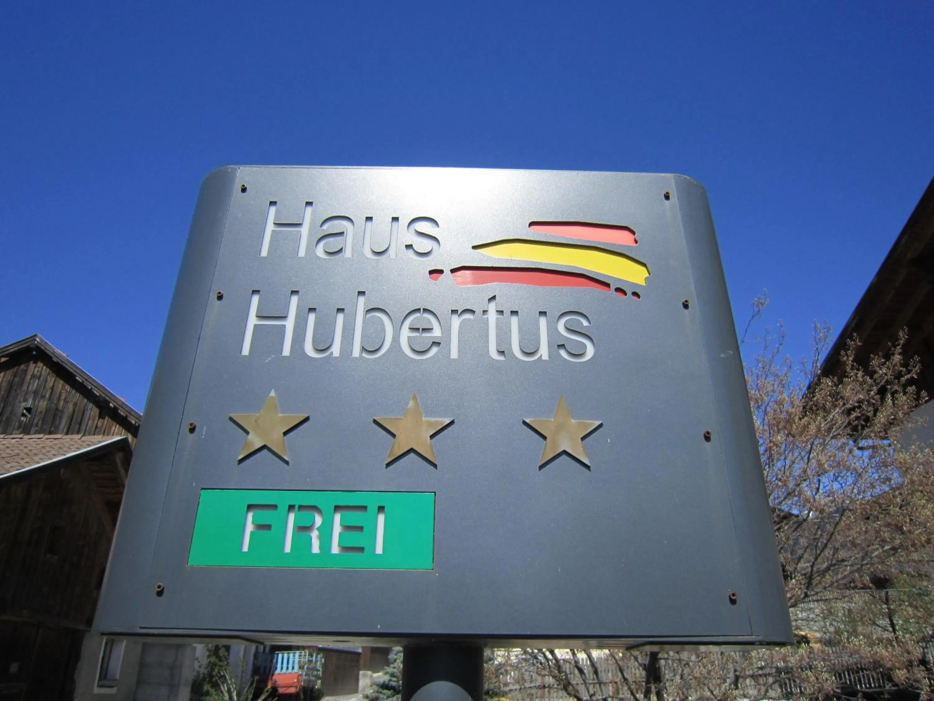 Property logo or sign in Aparthotel Garni Haus Hubertus
