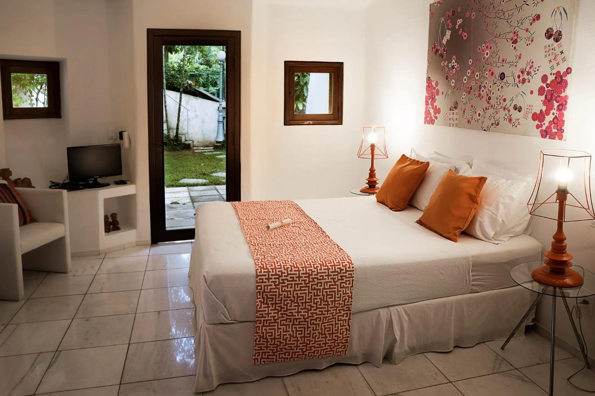 Bed in Les Jardins de Rio Boutique Hotel