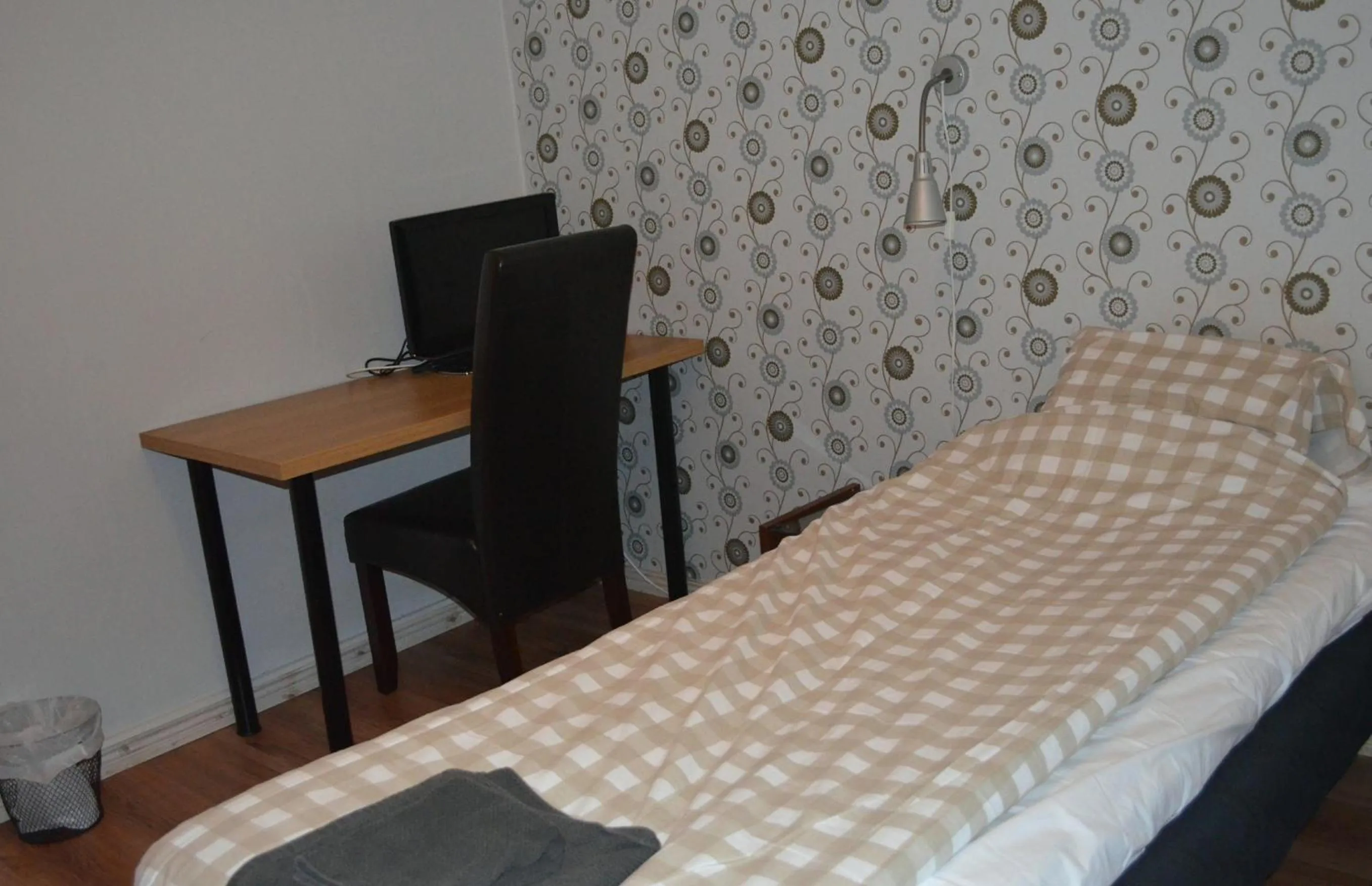 Decorative detail, Bed in Lyckåhem Lågprishotell och Vandrarhem