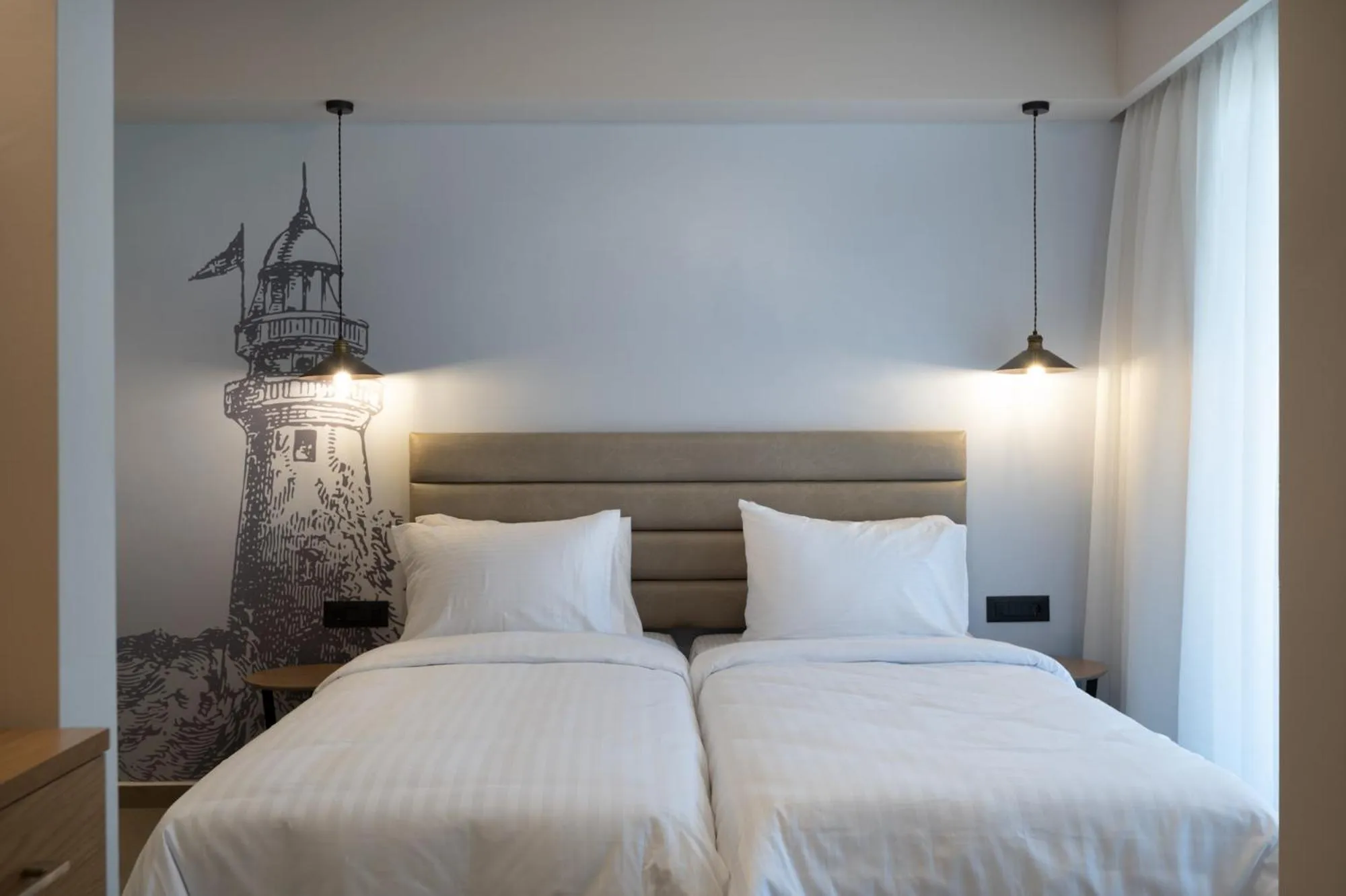 Bed in Prasonisi Light House Boutique Hotel