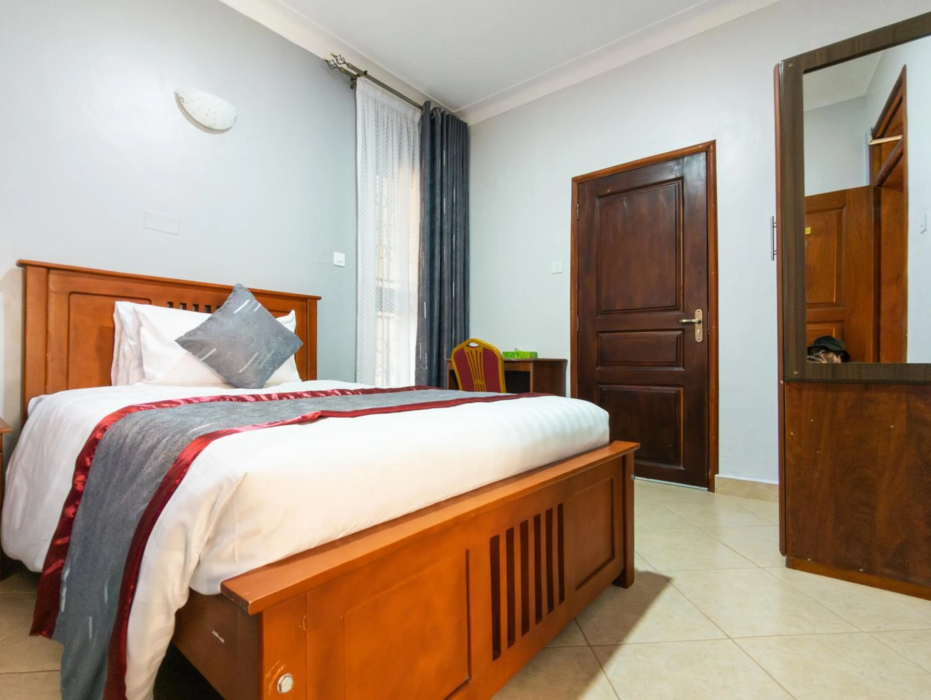 Photo of the whole room, Bed in Excelsis Garden Hotels - Kampala