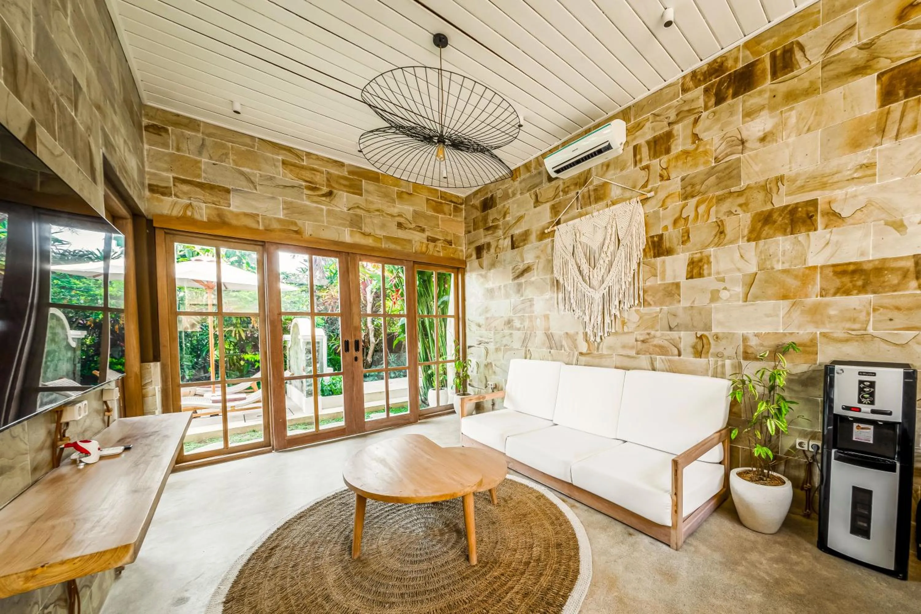 TV and multimedia in Nyaman Villas by EVDEkimi - Romantic escape among rice fields with Pool, Terrace - Long stay extras