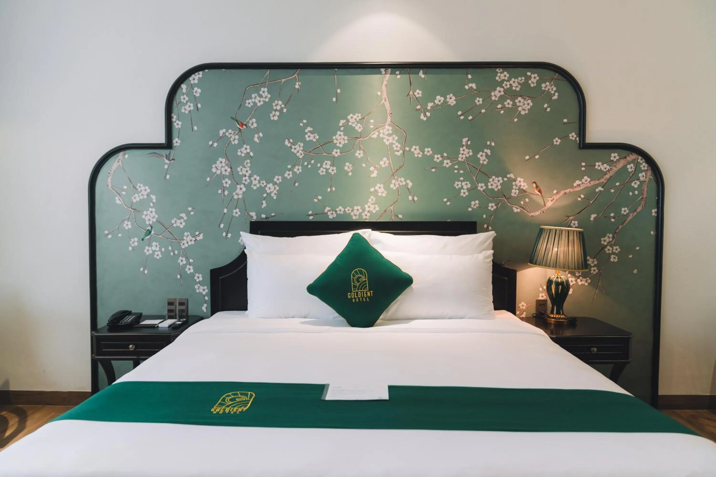 Bed in Goldient Boutique Hotel