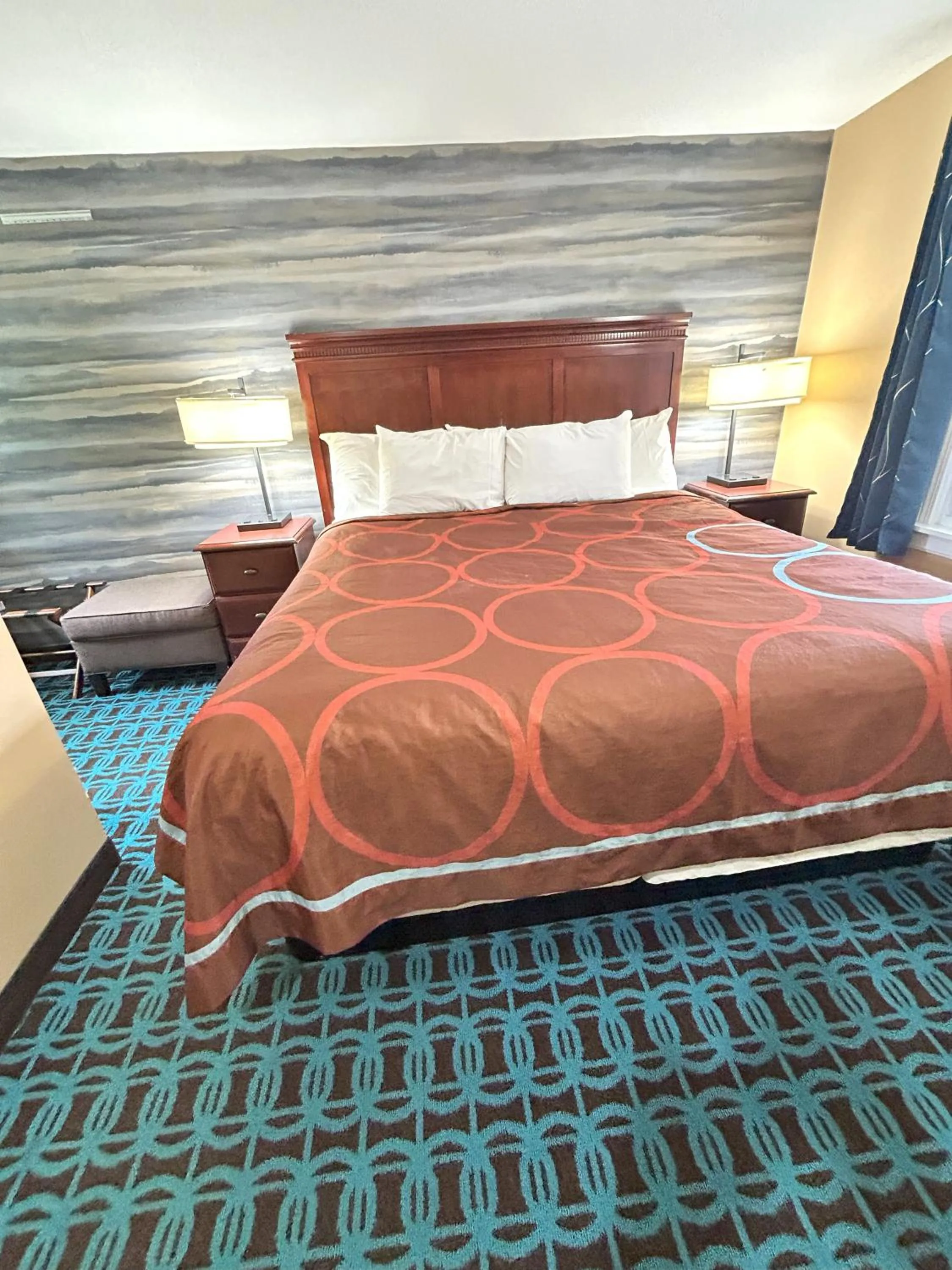 Bed in The Villager Motel