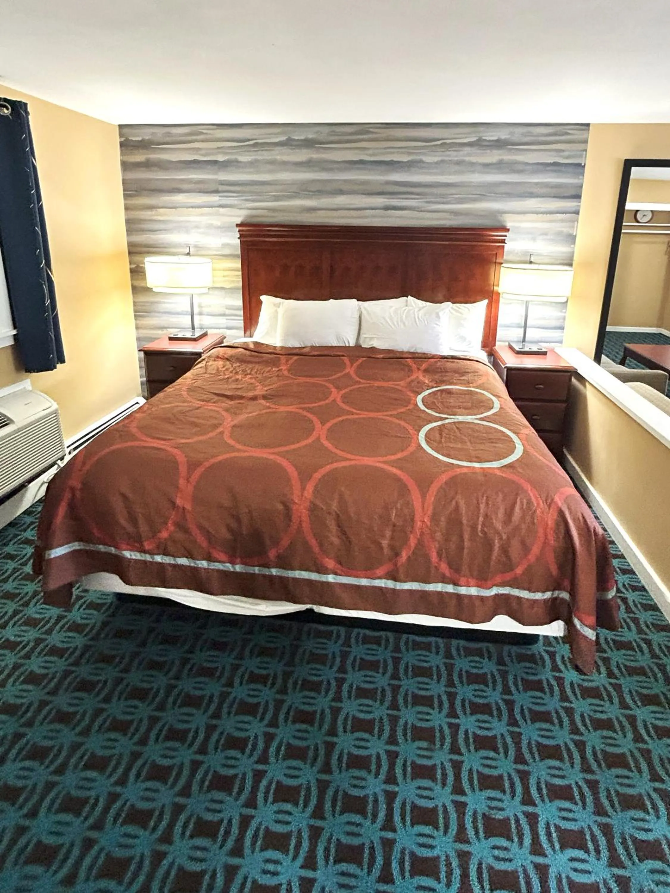 Bed in The Villager Motel