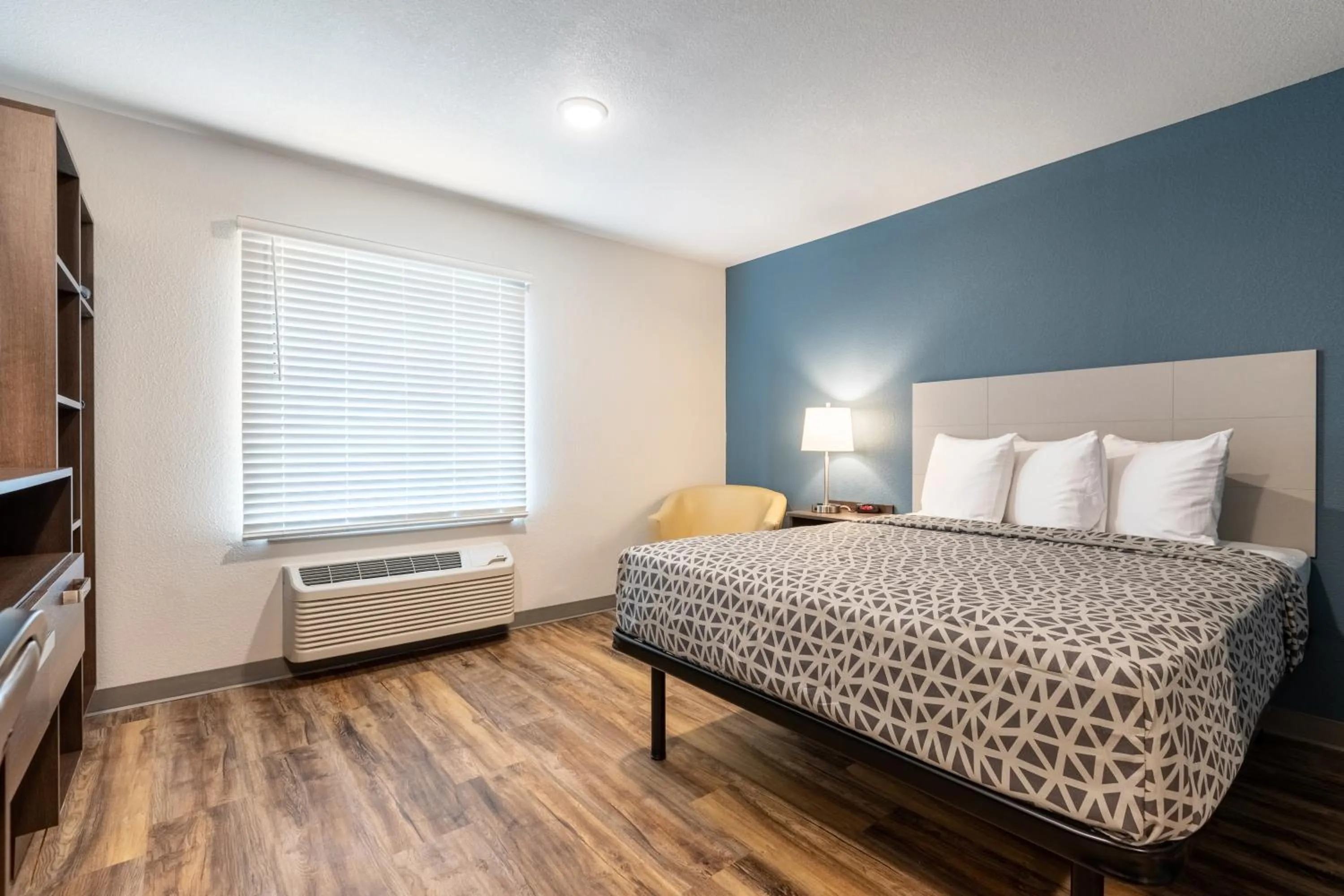 Bedroom, Bed in WoodSpring Suites Corona