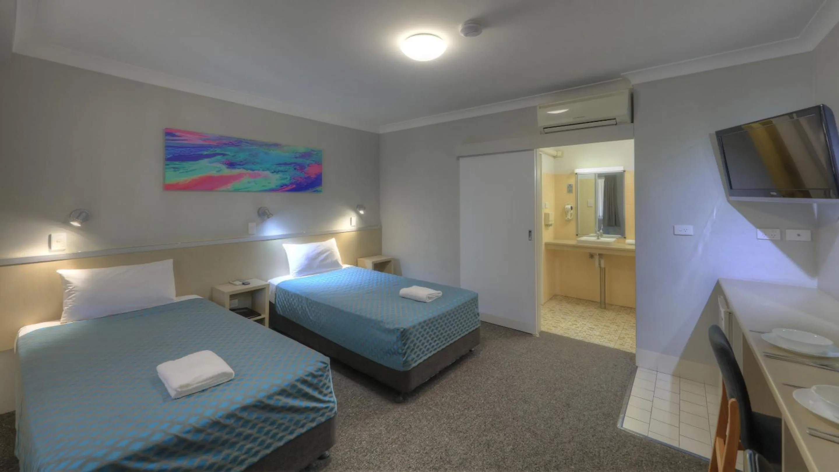 Bed in Grafton Central Motel