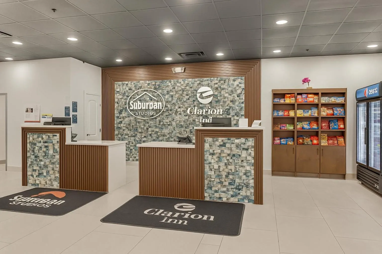 Property logo or sign in Suburban Studios Salt Lake City Airport