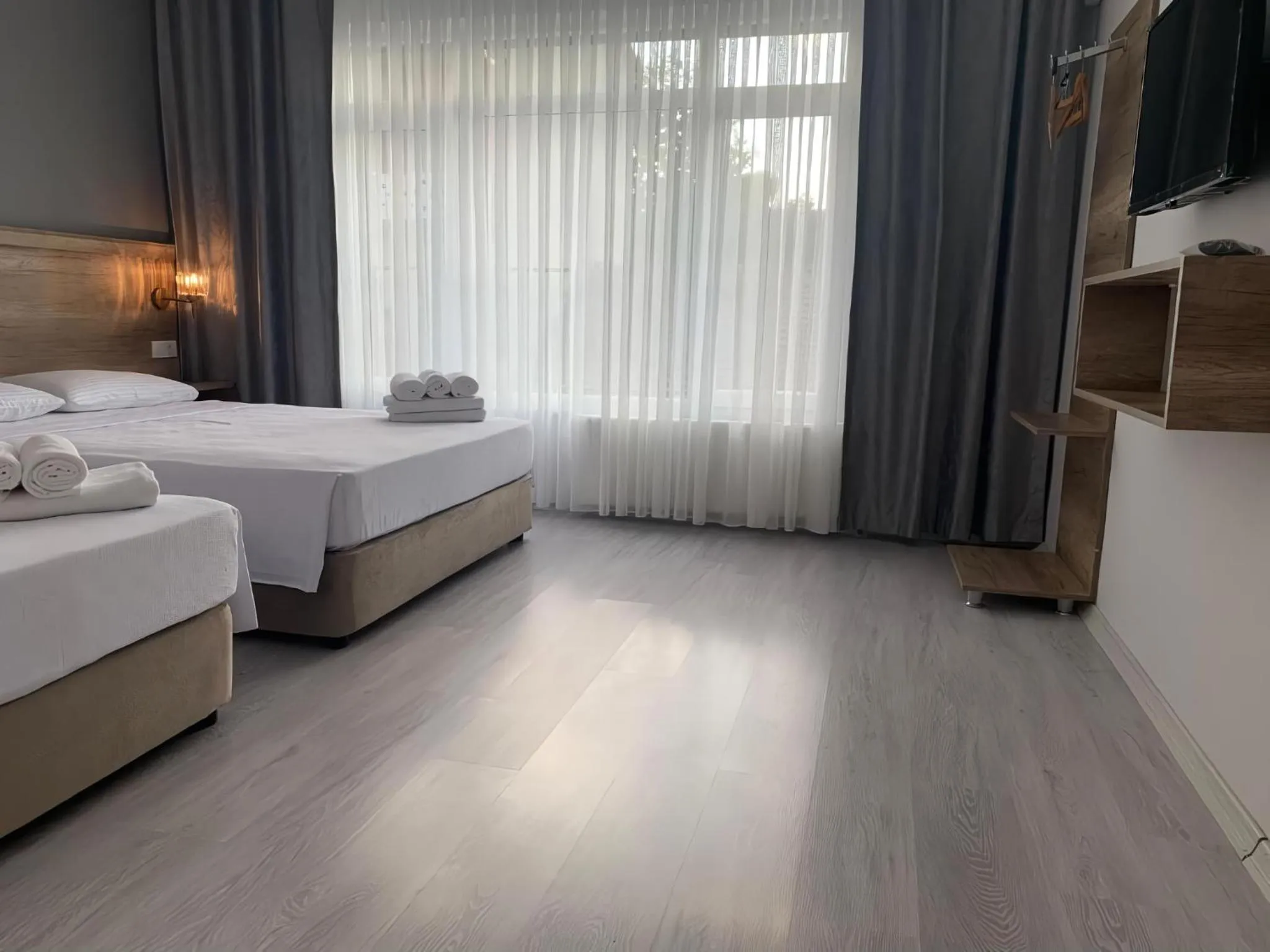 Communal lounge/ TV room, Bed in Rinascente