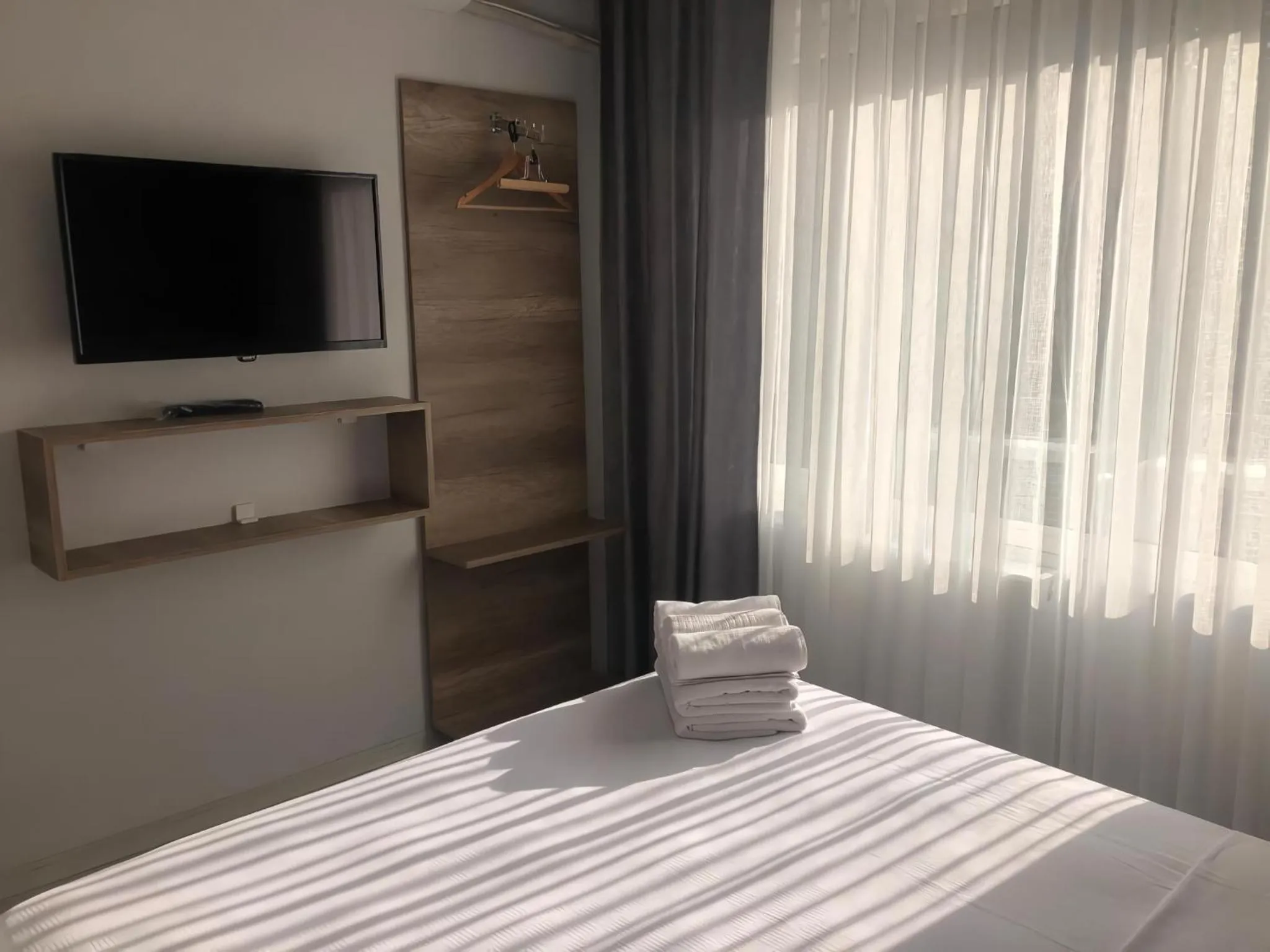 Communal lounge/ TV room, Bed in Rinascente