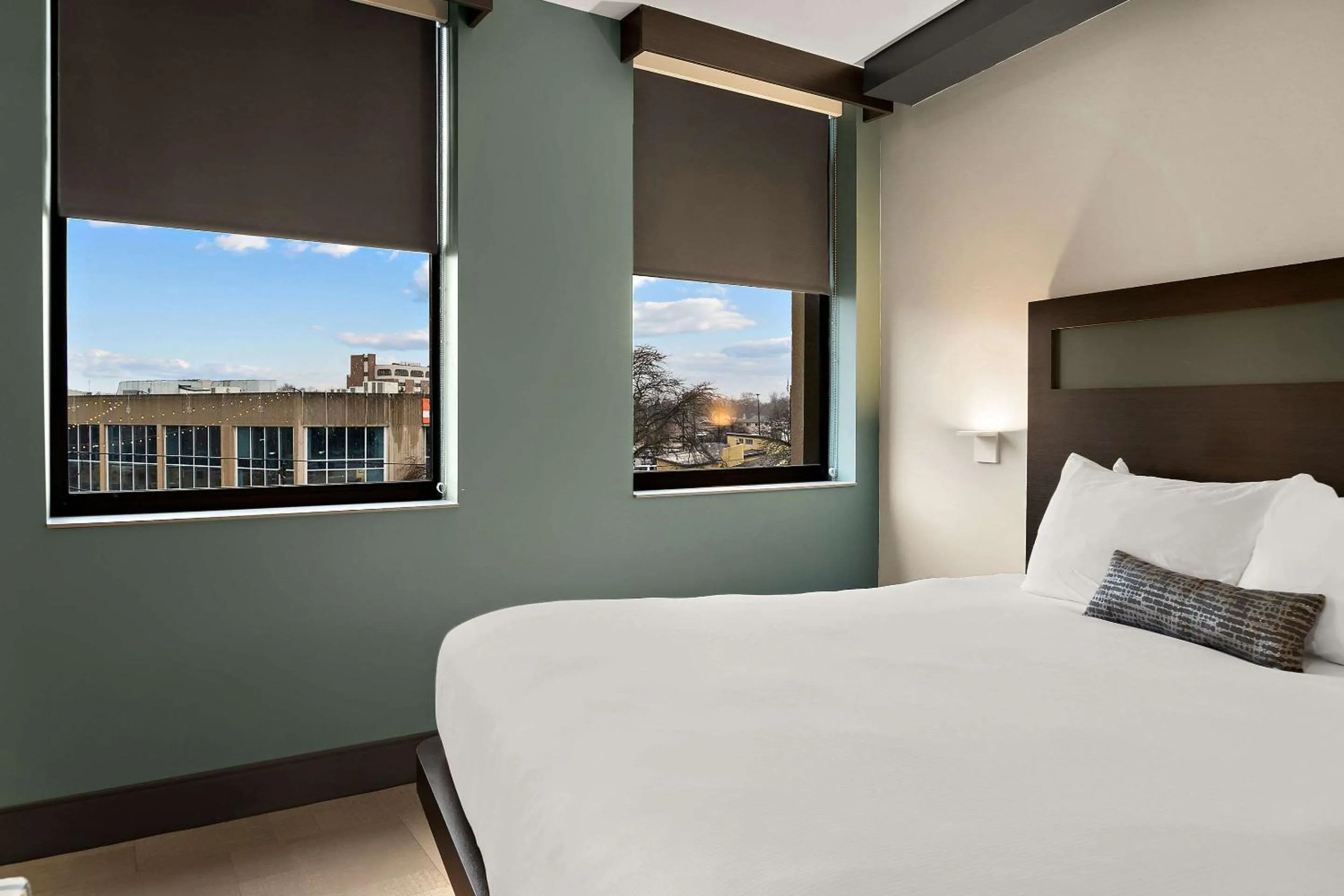 Bedroom in CityFlatsHotel - Port Huron, an Ascend Collection Hotel