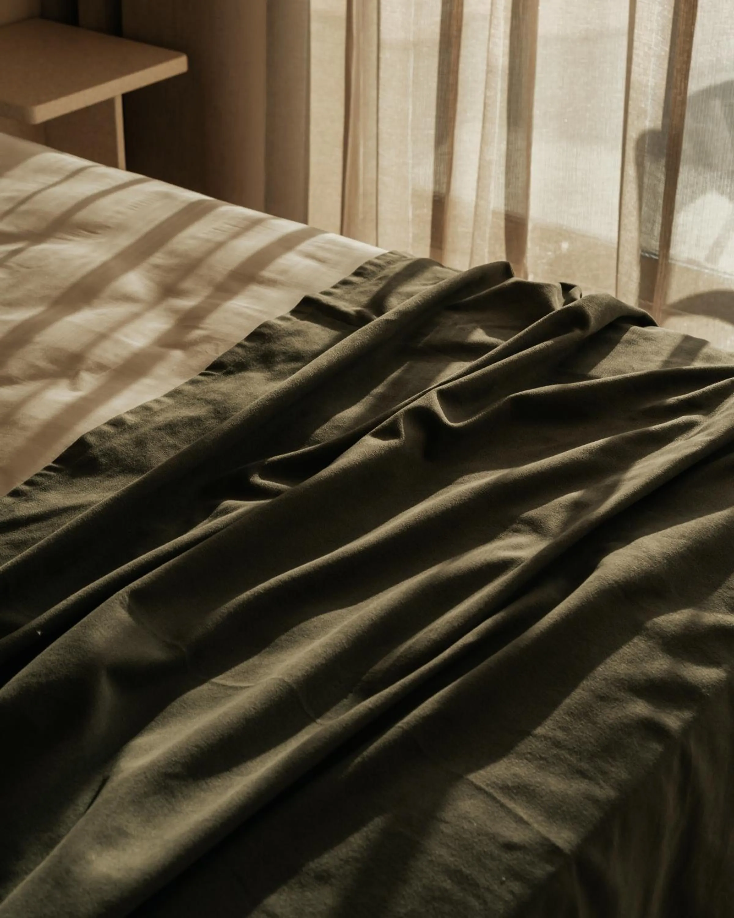 Bed in AMÉNTE Mindful Stay