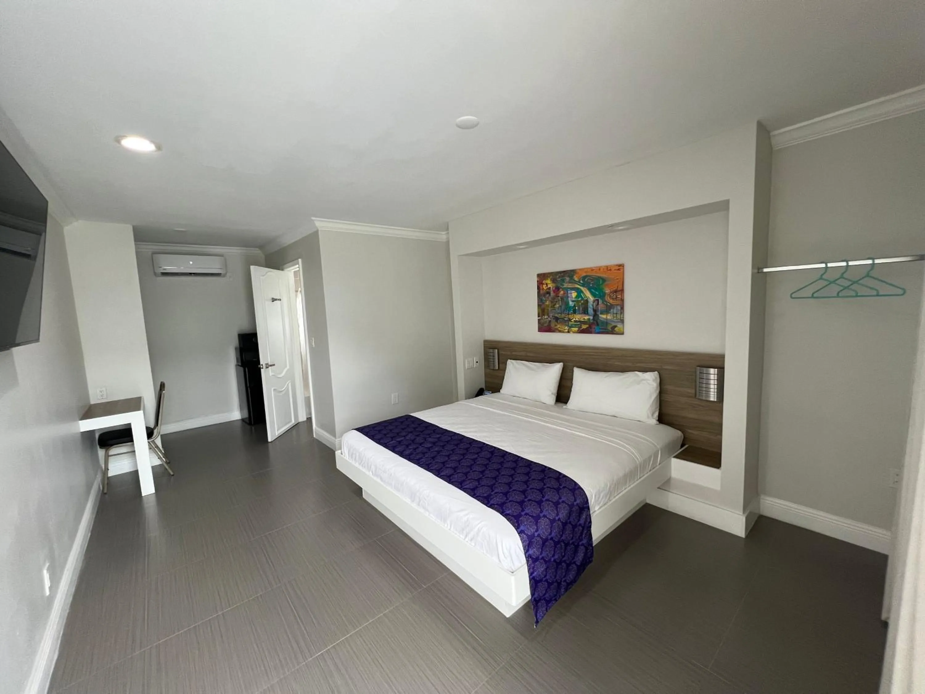 Bed in The Biscayne Hotel