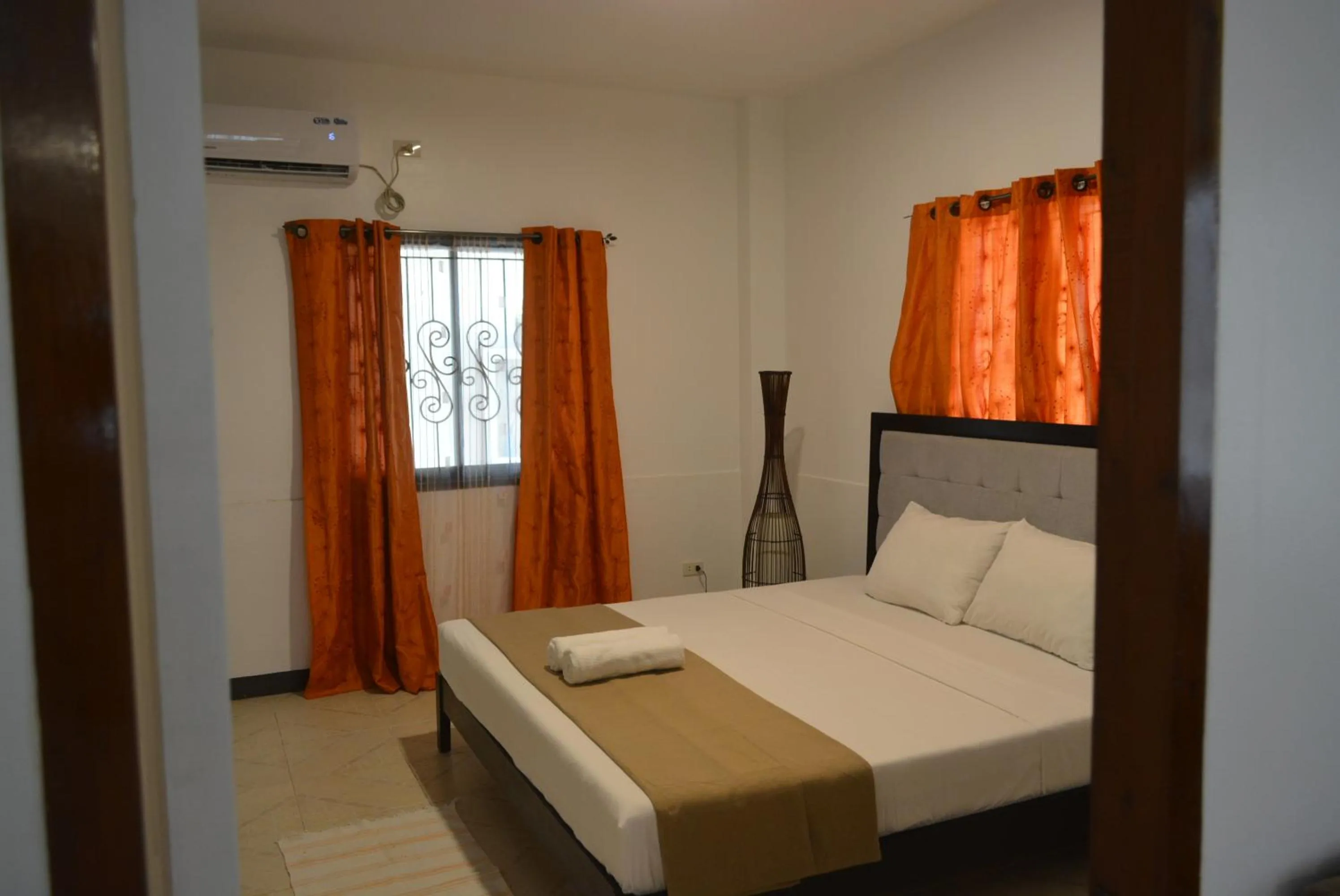 Bed in CHIISAI NATSU RESORT