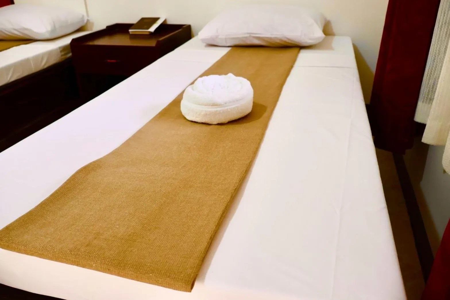 Bed in CHIISAI NATSU RESORT