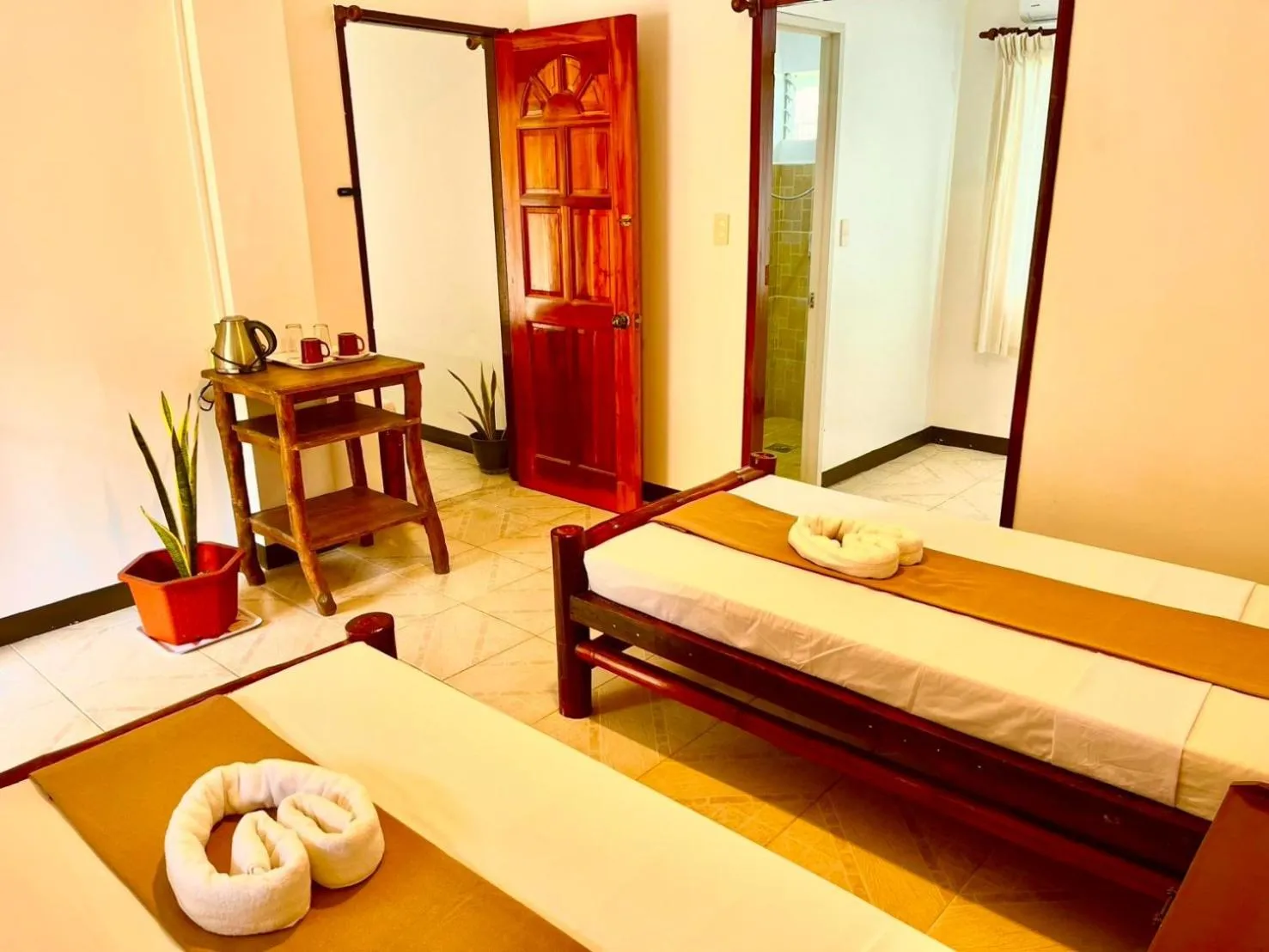 Bed in CHIISAI NATSU RESORT