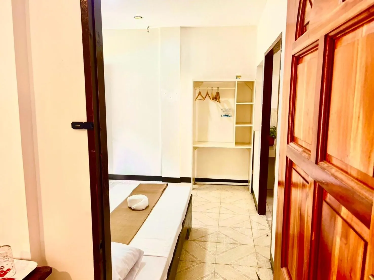 Bed in CHIISAI NATSU RESORT