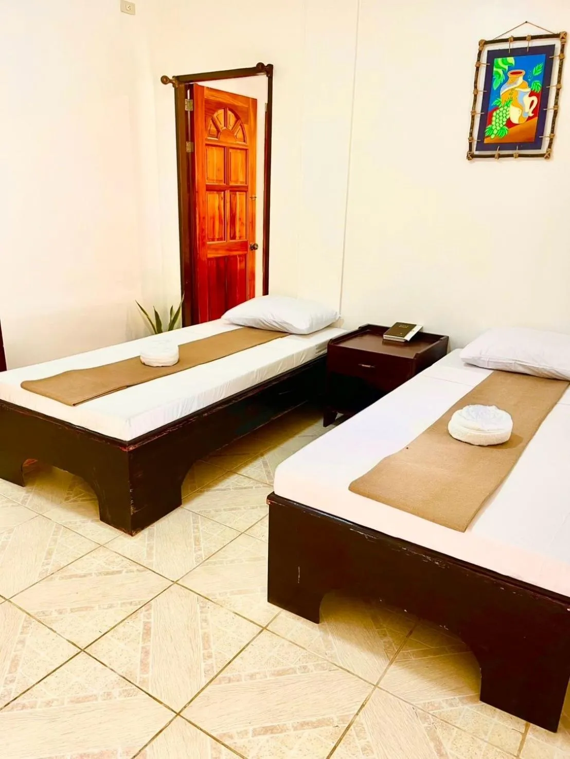 Bed in CHIISAI NATSU RESORT