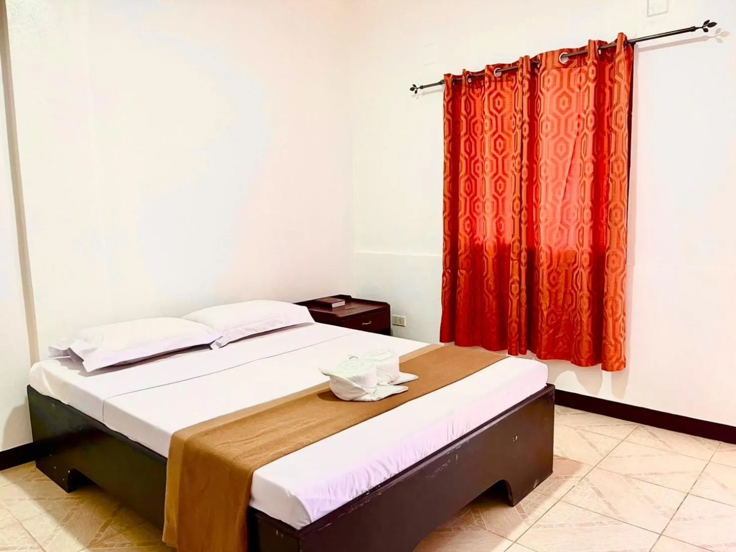 Bed in CHIISAI NATSU RESORT