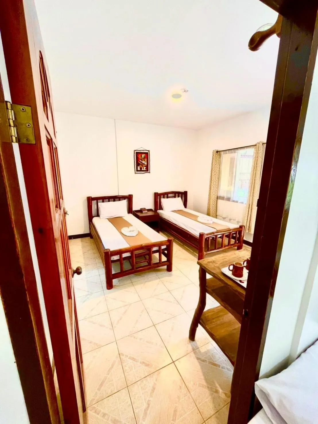 Bed in CHIISAI NATSU RESORT