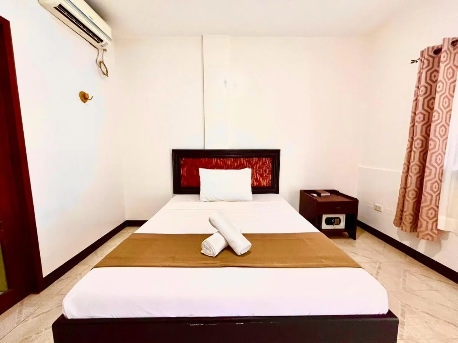 Bed in CHIISAI NATSU RESORT