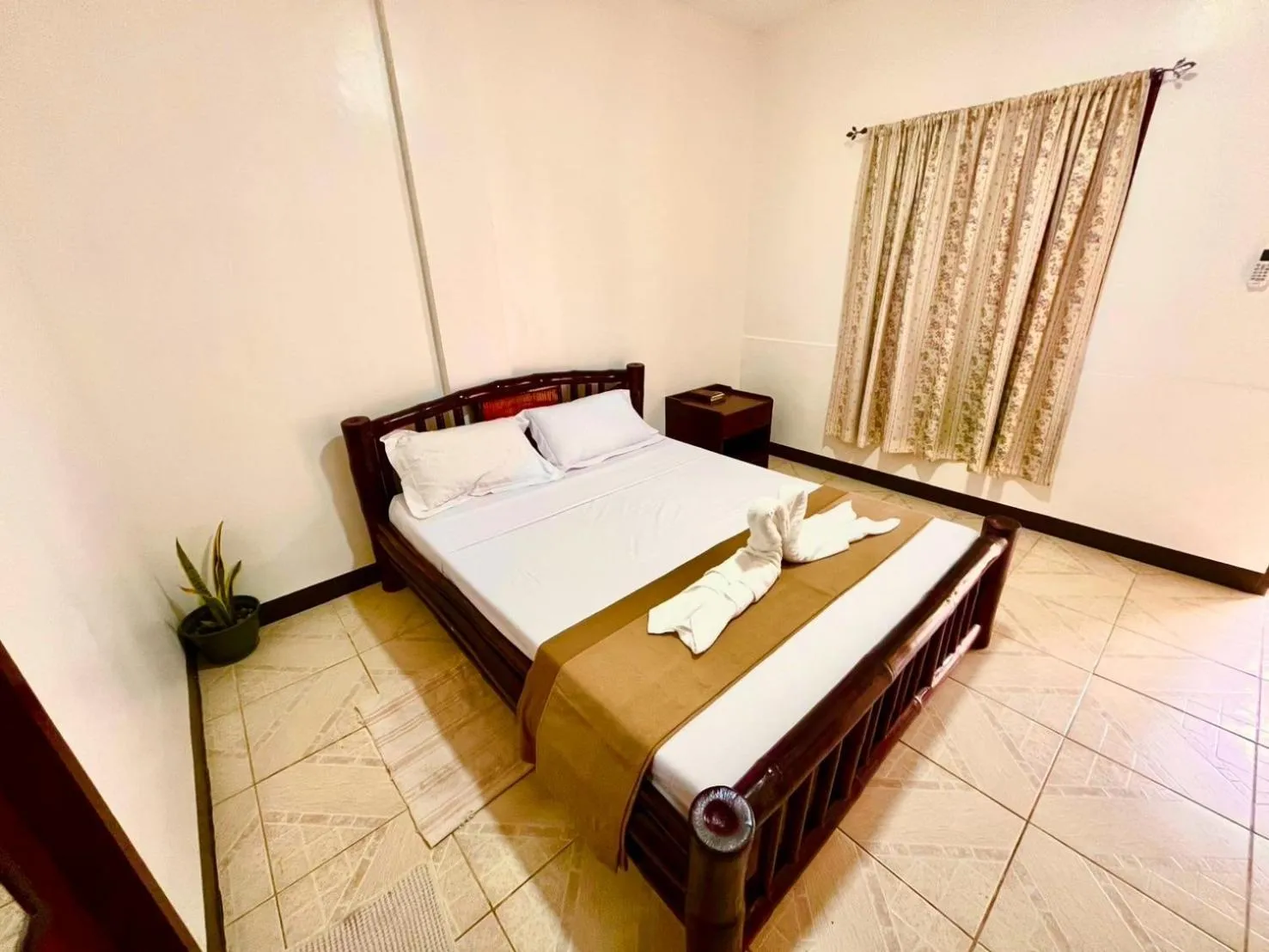 Bed in CHIISAI NATSU RESORT