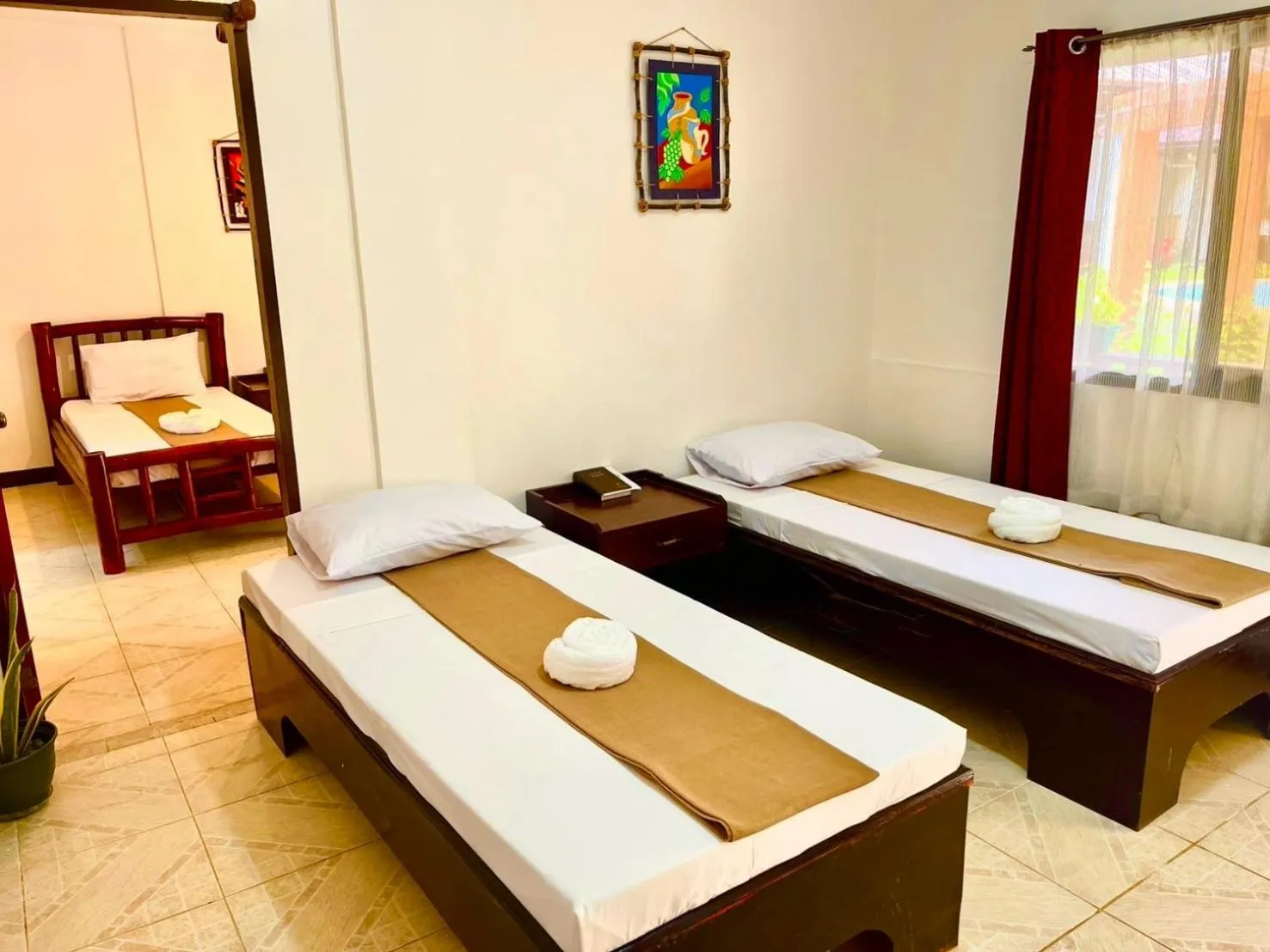 Bed in CHIISAI NATSU RESORT