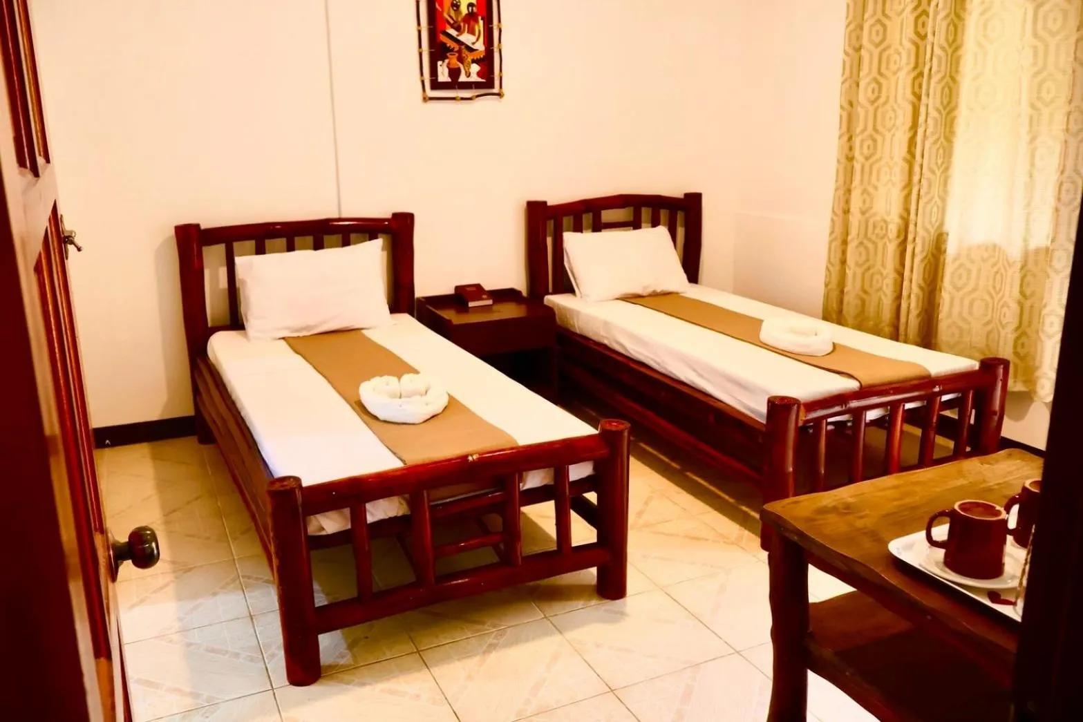 Bed in CHIISAI NATSU RESORT