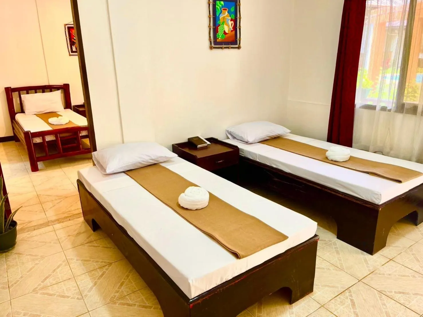 Bed in CHIISAI NATSU RESORT