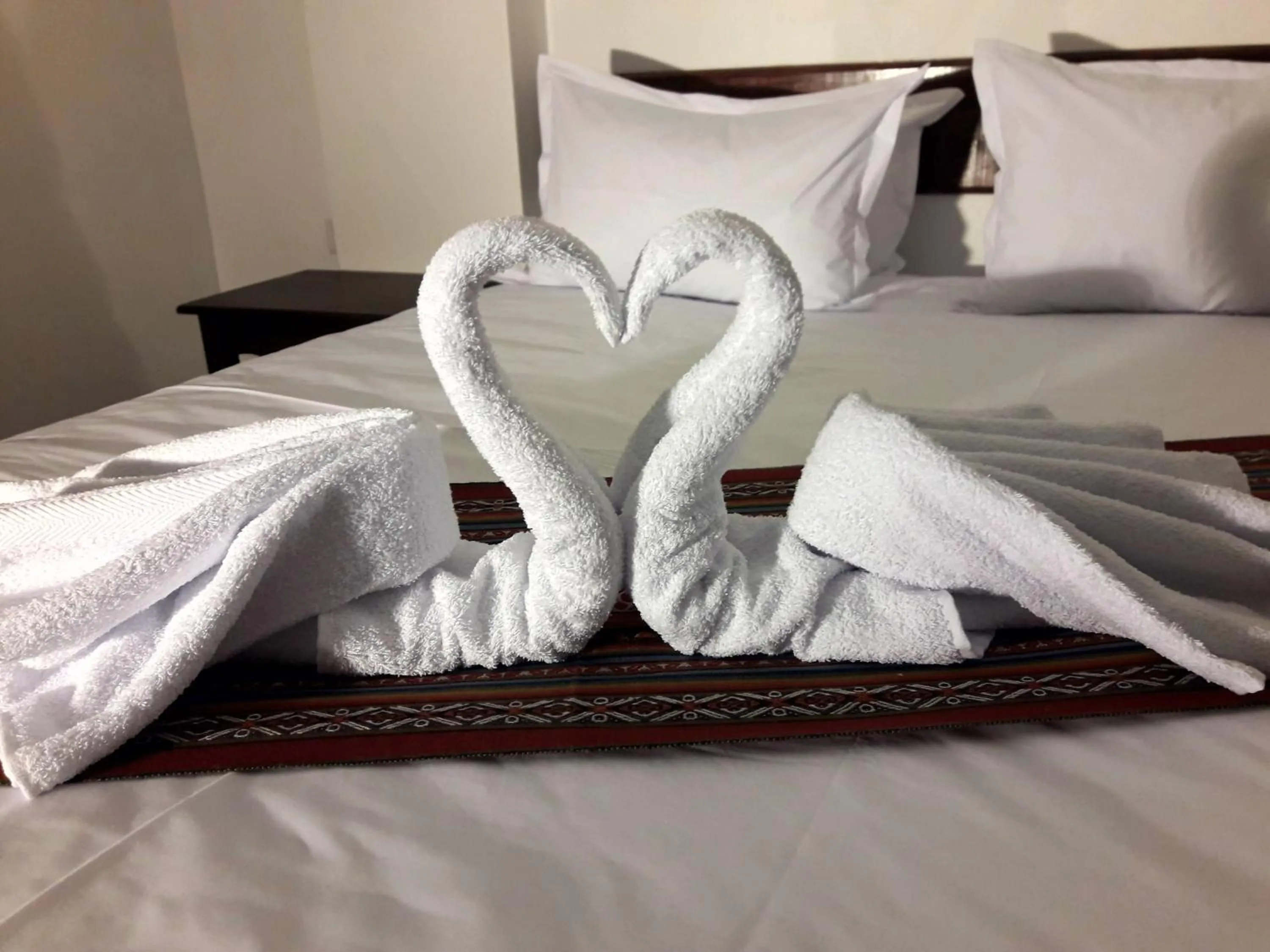 Bed in PAKARINA HOTEL