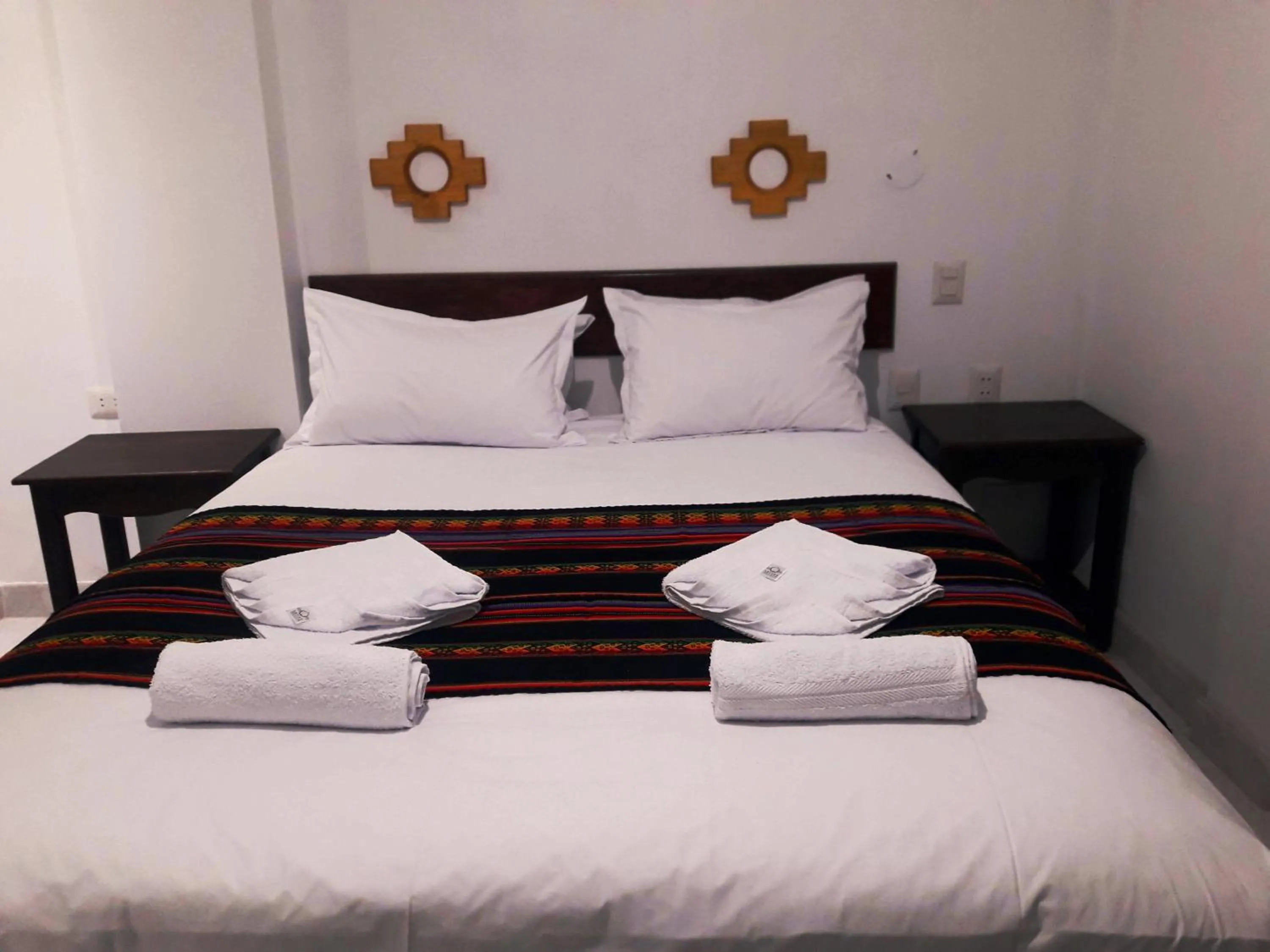 Bed in PAKARINA HOTEL