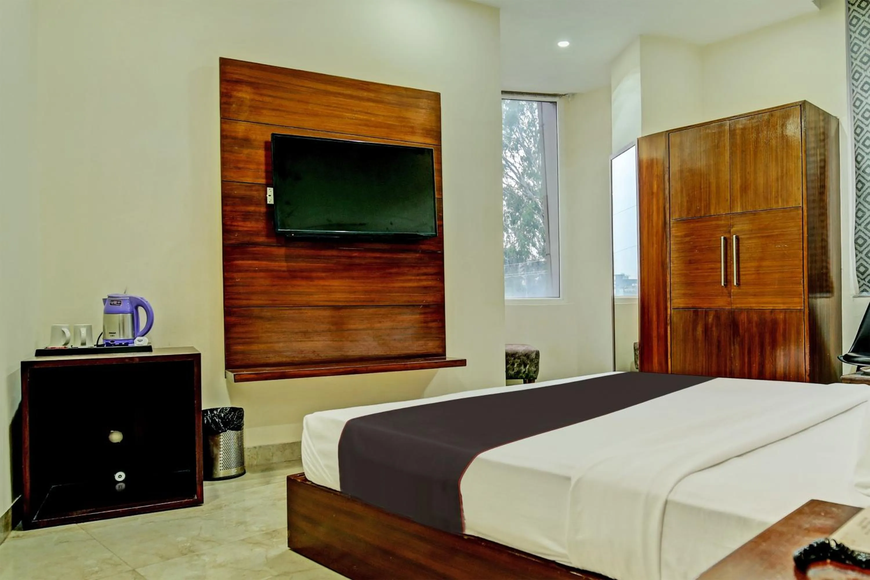 Bedroom, Bed in Super Townhouse Eastern View Formerly Vihaan Residency