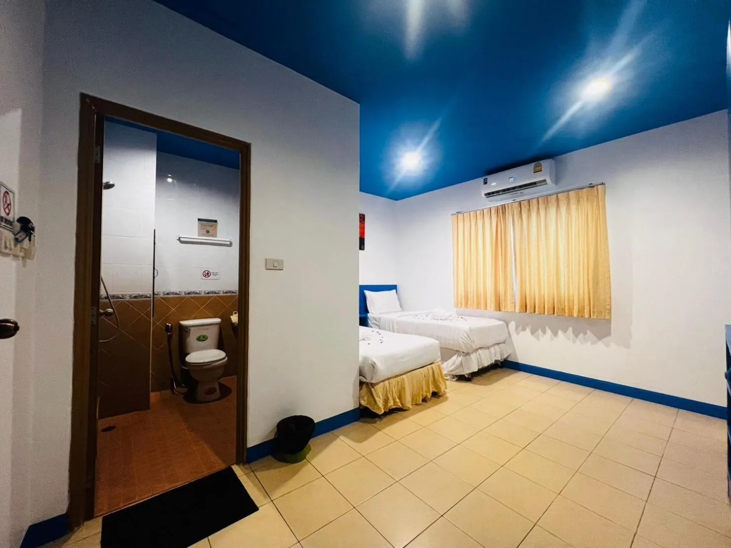 Bed in Blue Planet Hotel