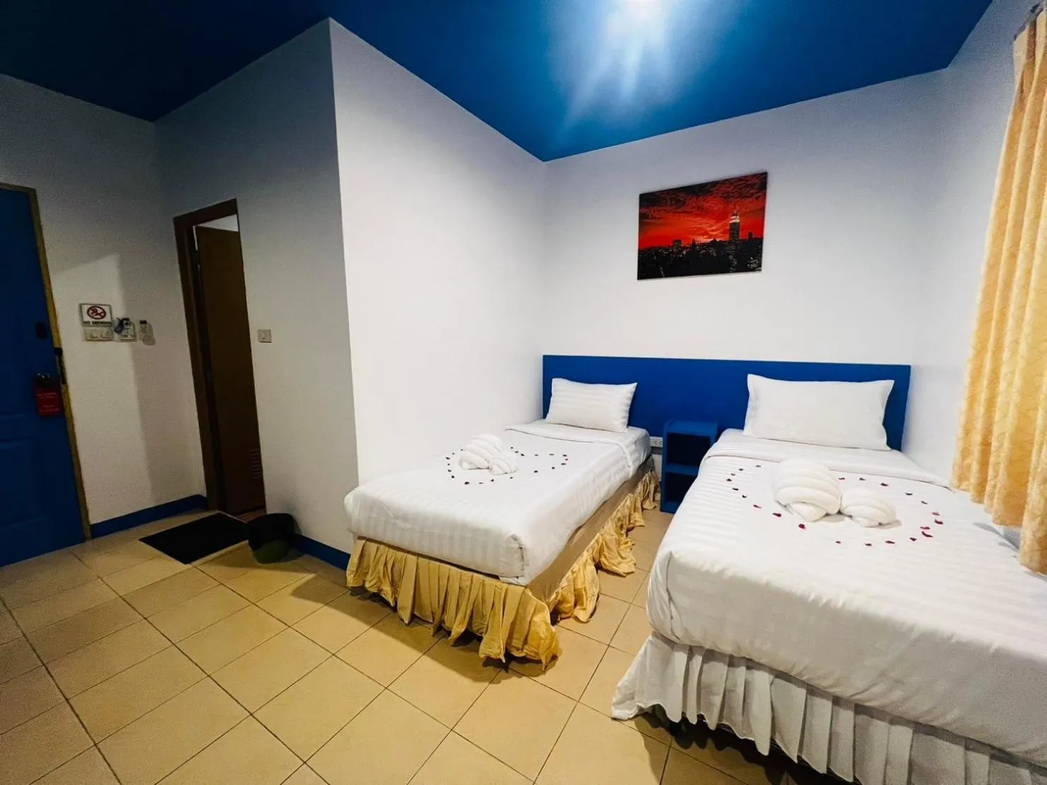 Bed in Blue Planet Hotel