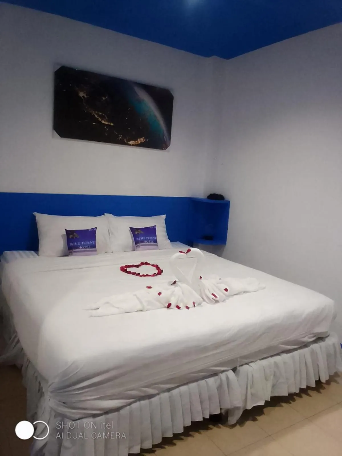 Bed in Blue Planet Hotel