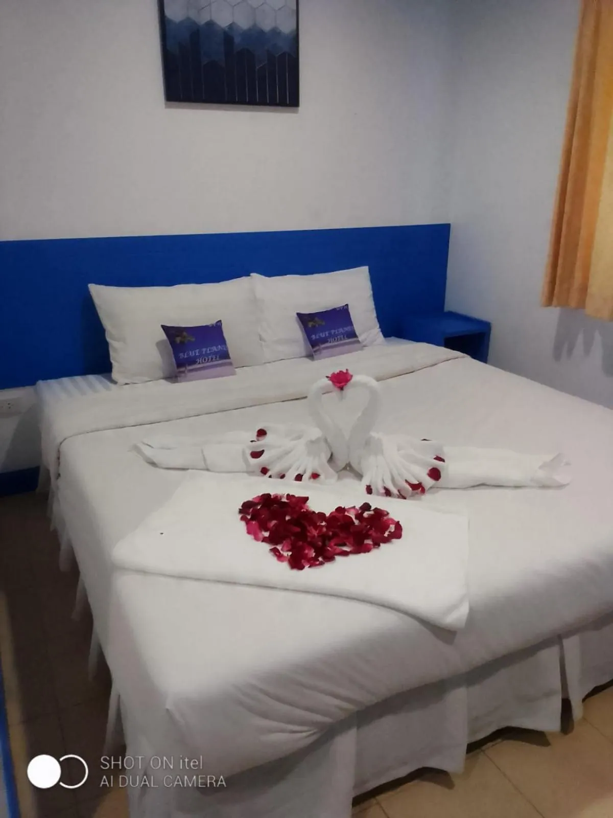 Bed in Blue Planet Hotel