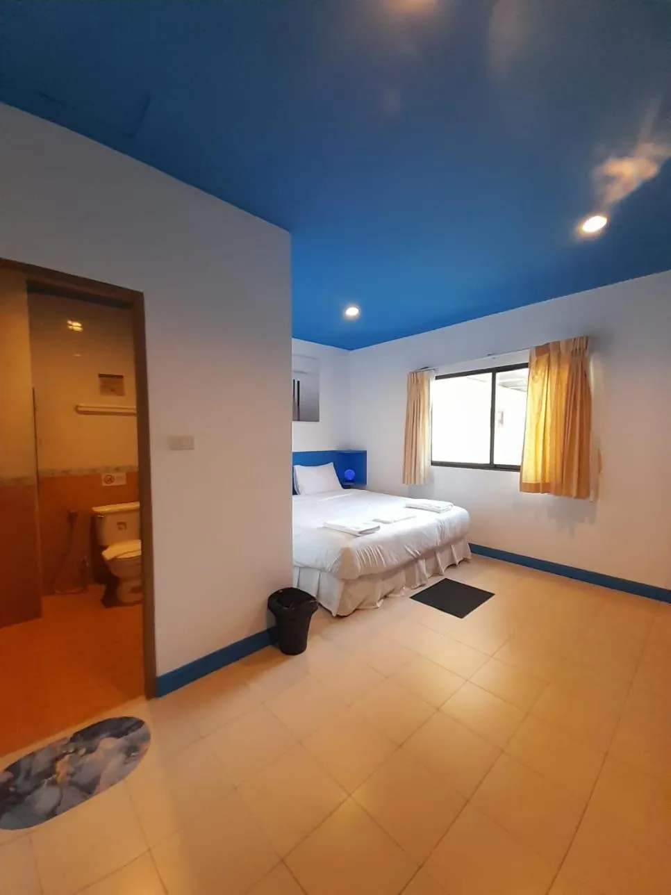 Bed in Blue Planet Hotel