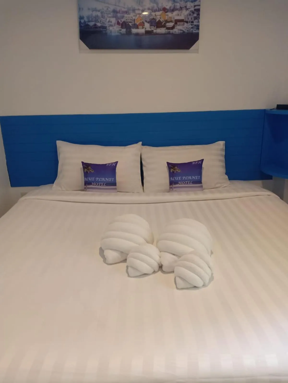 Bed in Blue Planet Hotel