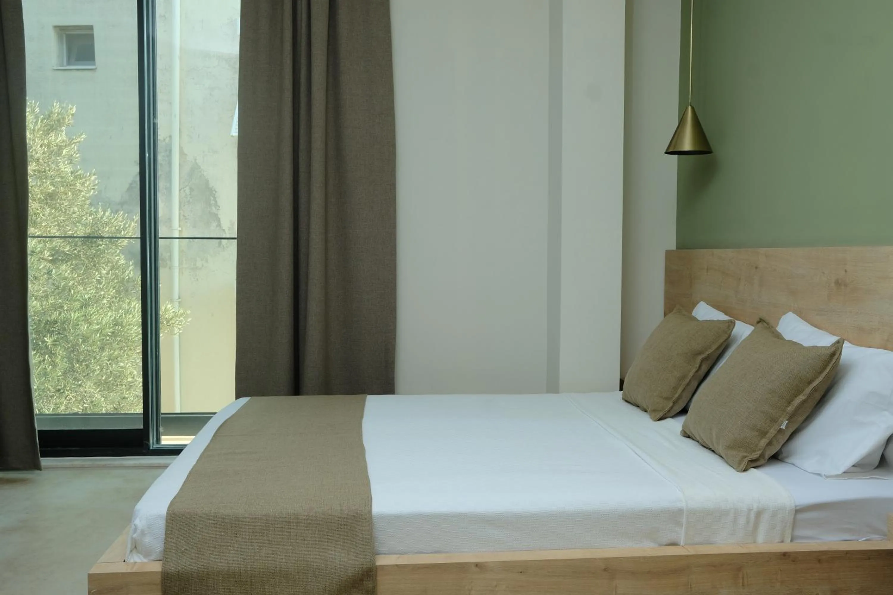 Bed in Kaktus Suites