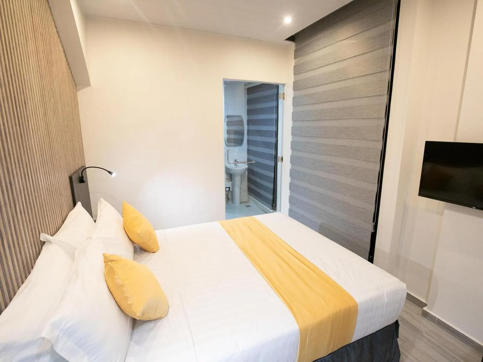 Bed in City Pod Hotel