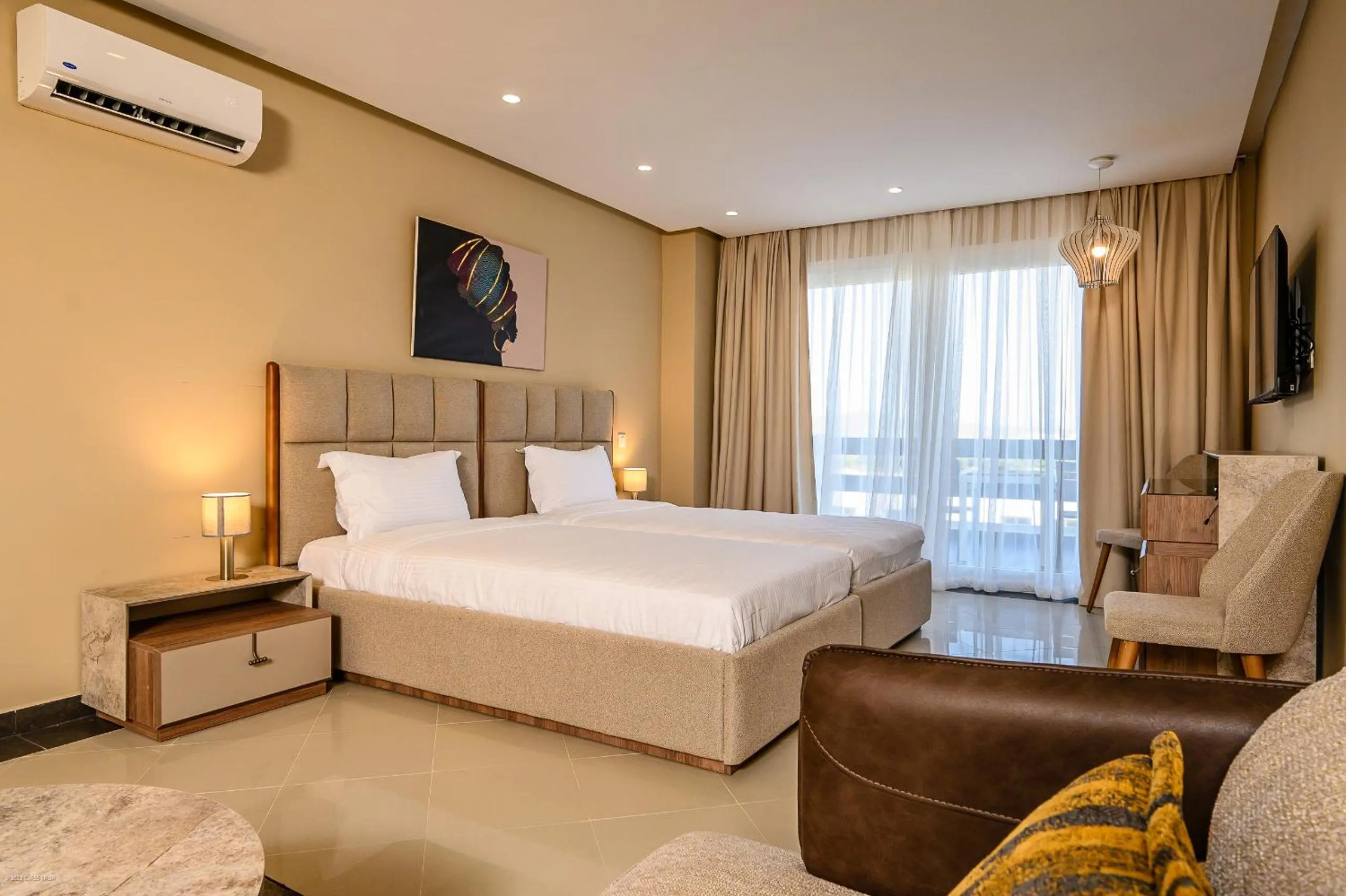 Bed in PLAYA DEL PACHA Suites Hotel