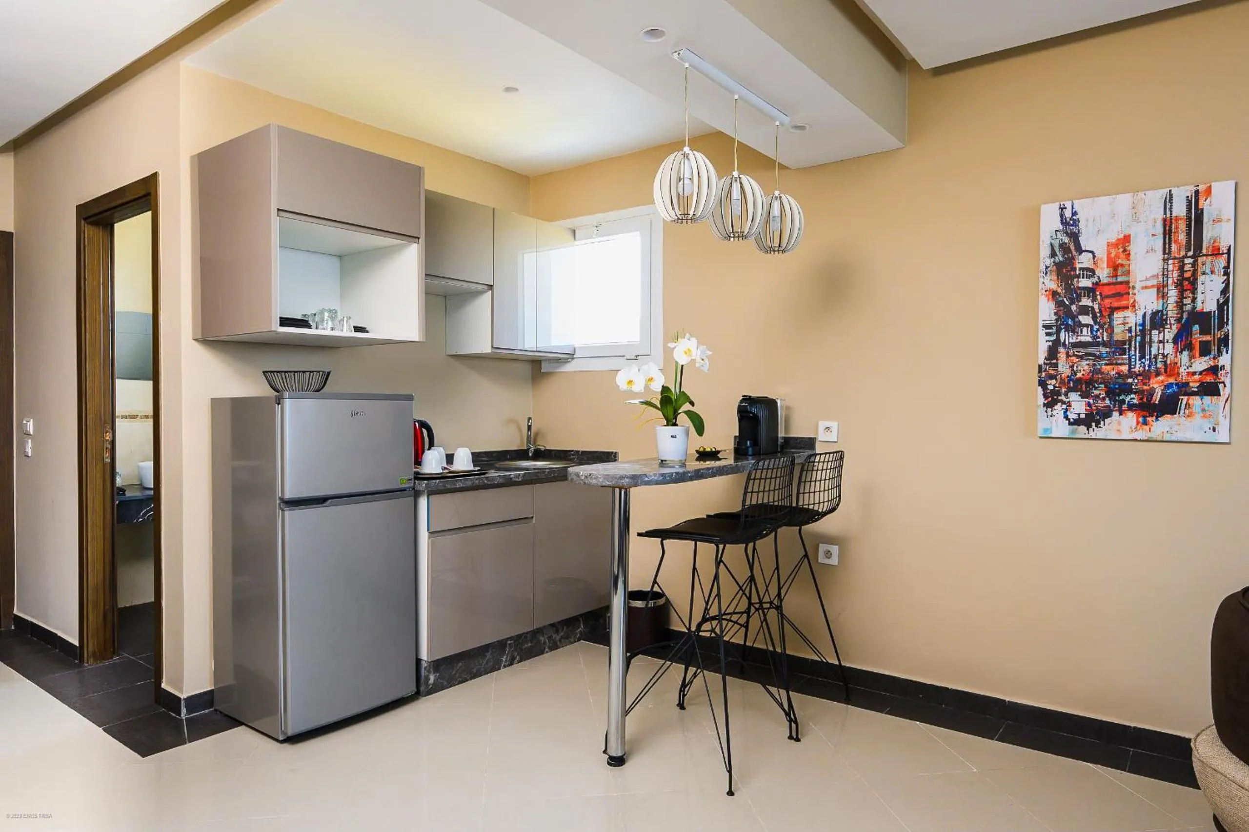 Kitchen or kitchenette in PLAYA DEL PACHA Suites Hotel