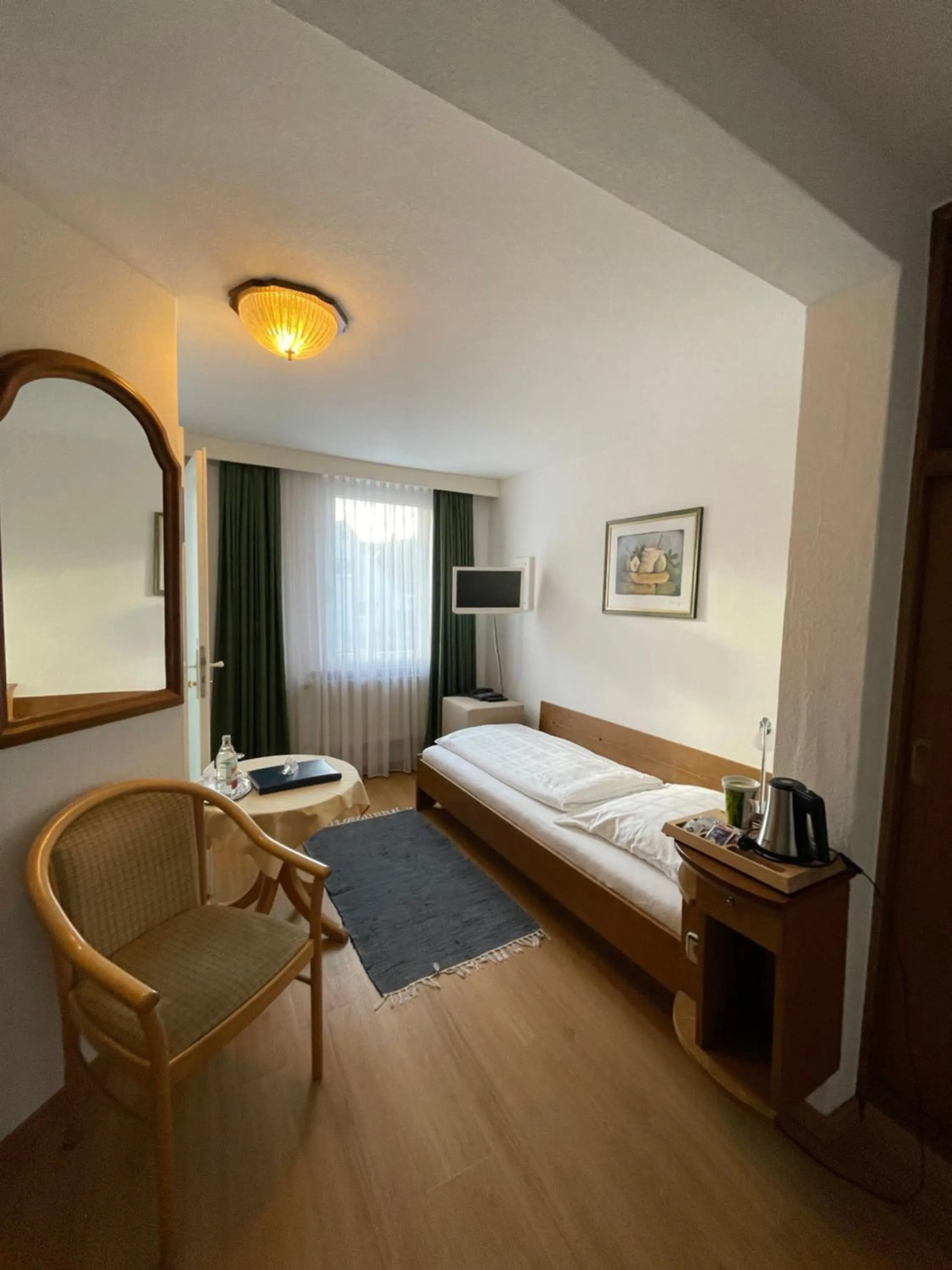 Photo of the whole room, Bed in Hotel Württemberger Hof Garni
