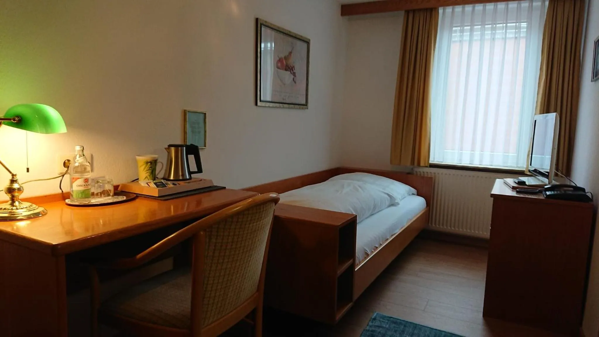Photo of the whole room, Bed in Hotel Württemberger Hof Garni
