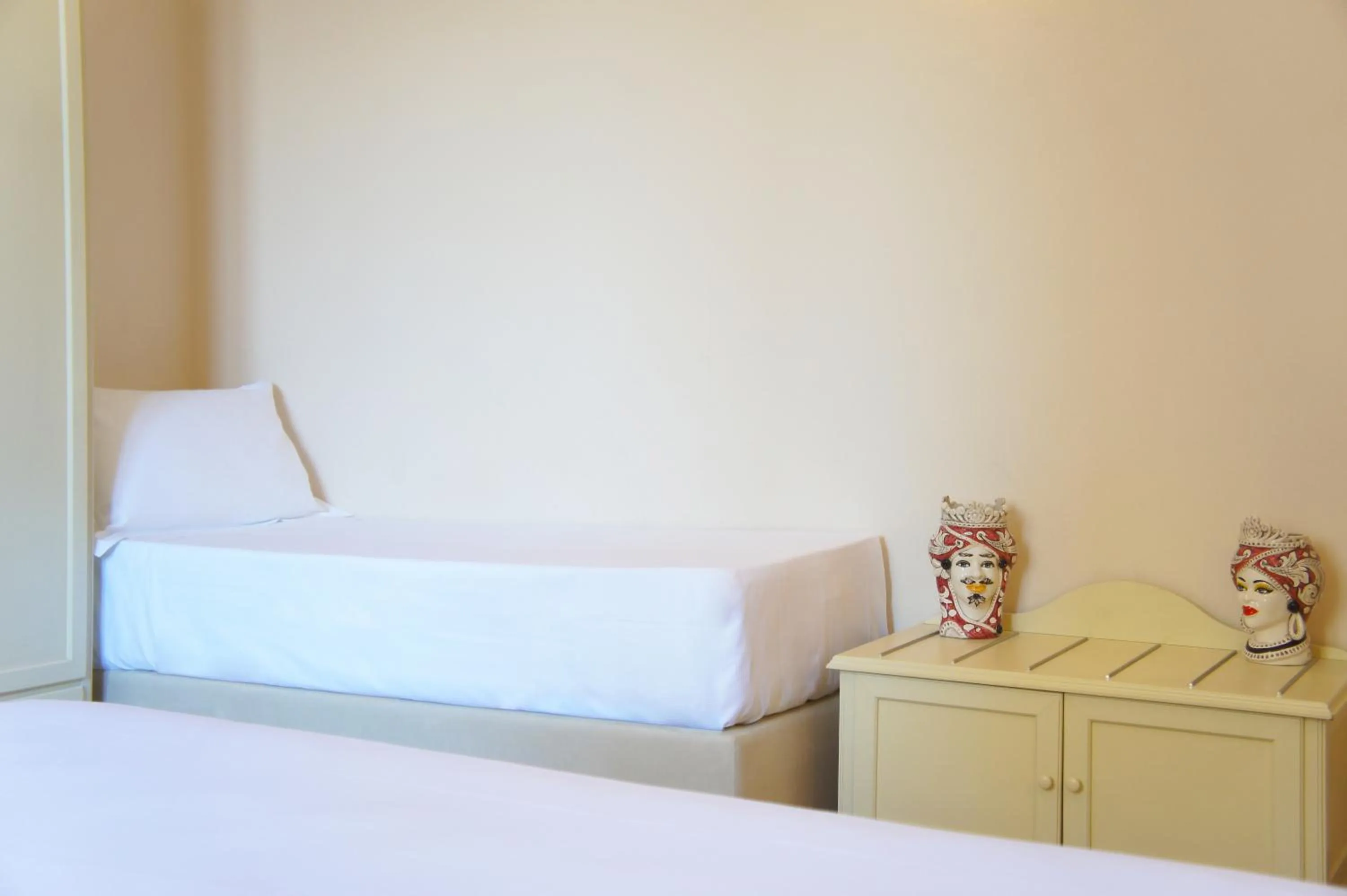 Bed in Hotel le Muse