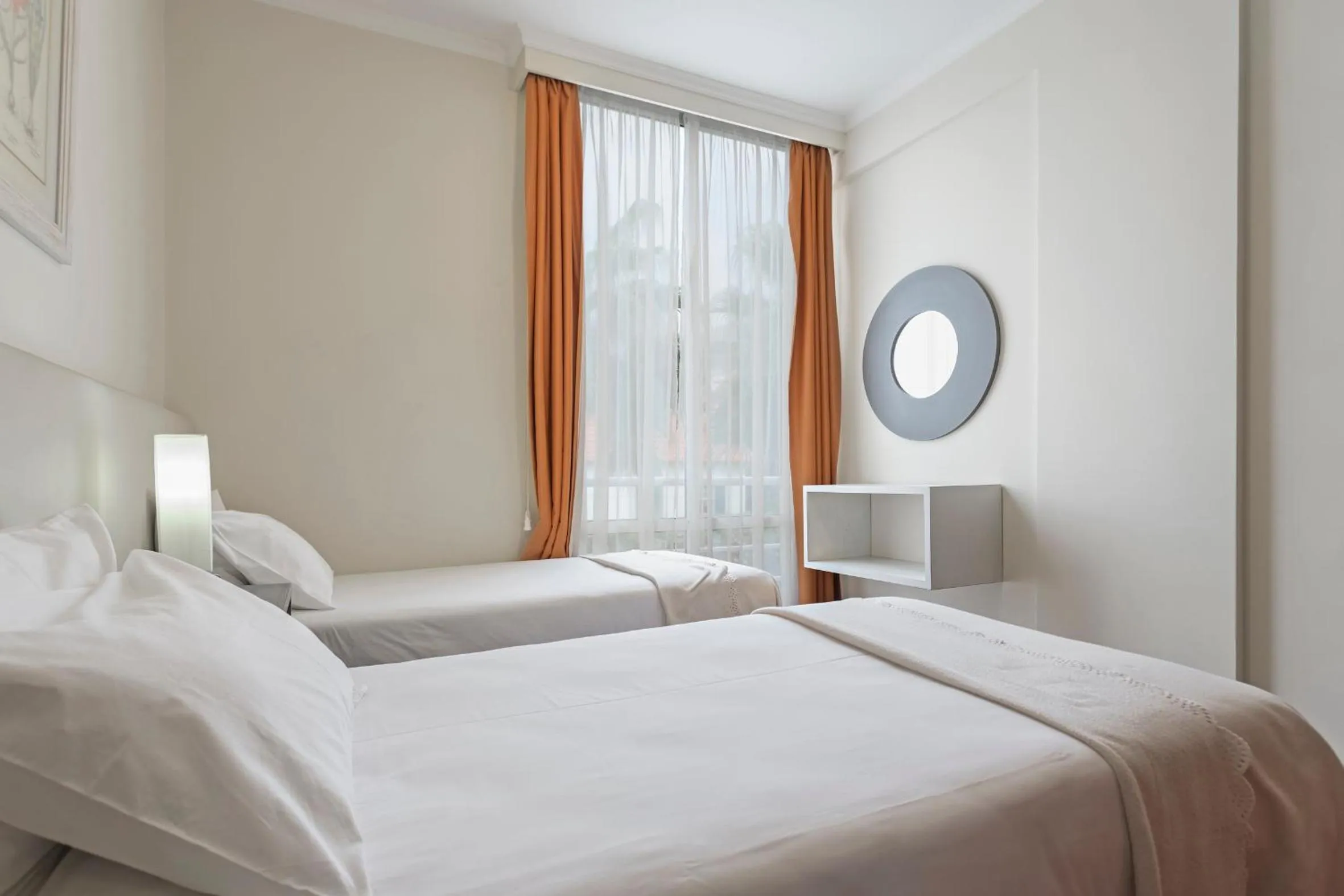 Bed in Achada I by An Island Apart